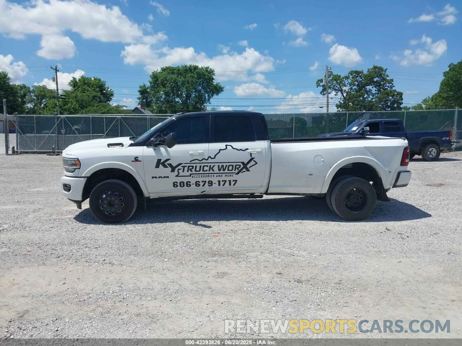14 Photograph of a damaged car 3C63RRJL2NG355679 RAM 3500 2022