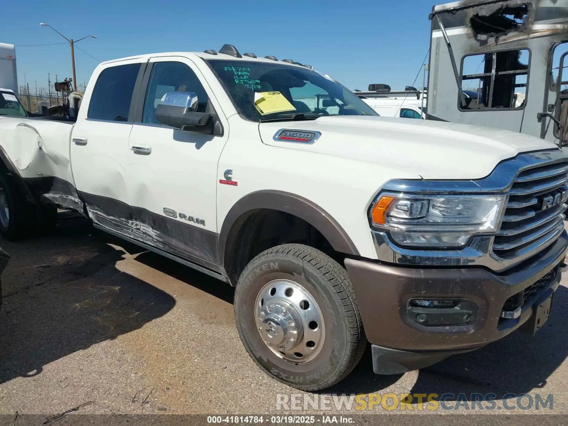 1 Photograph of a damaged car 3C63RRKL2NG153245 RAM 3500 2022