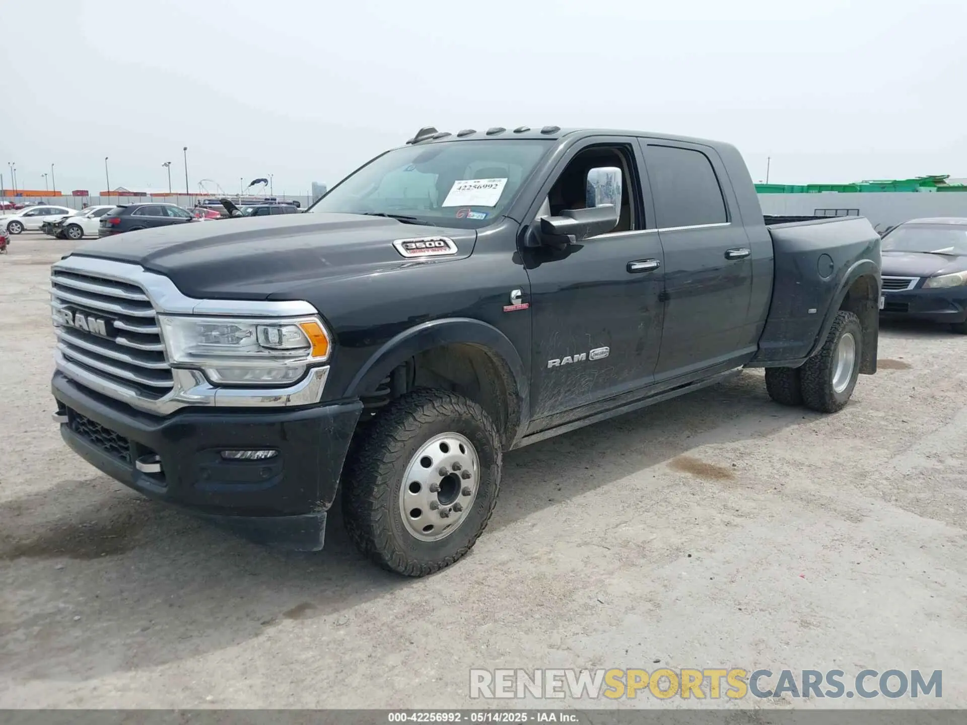 2 Photograph of a damaged car 3C63RRNLXNG402001 RAM 3500 2022