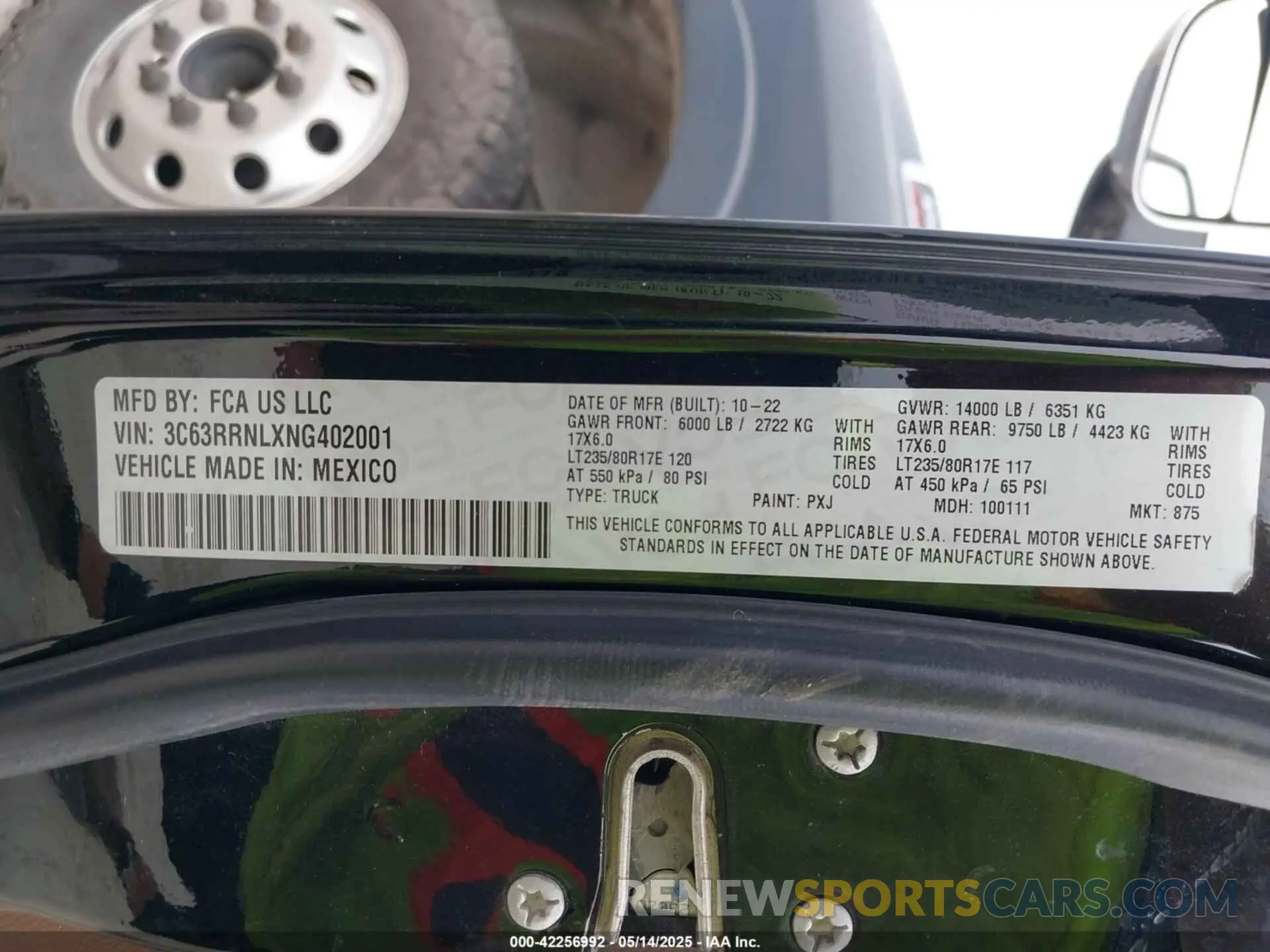 9 Photograph of a damaged car 3C63RRNLXNG402001 RAM 3500 2022