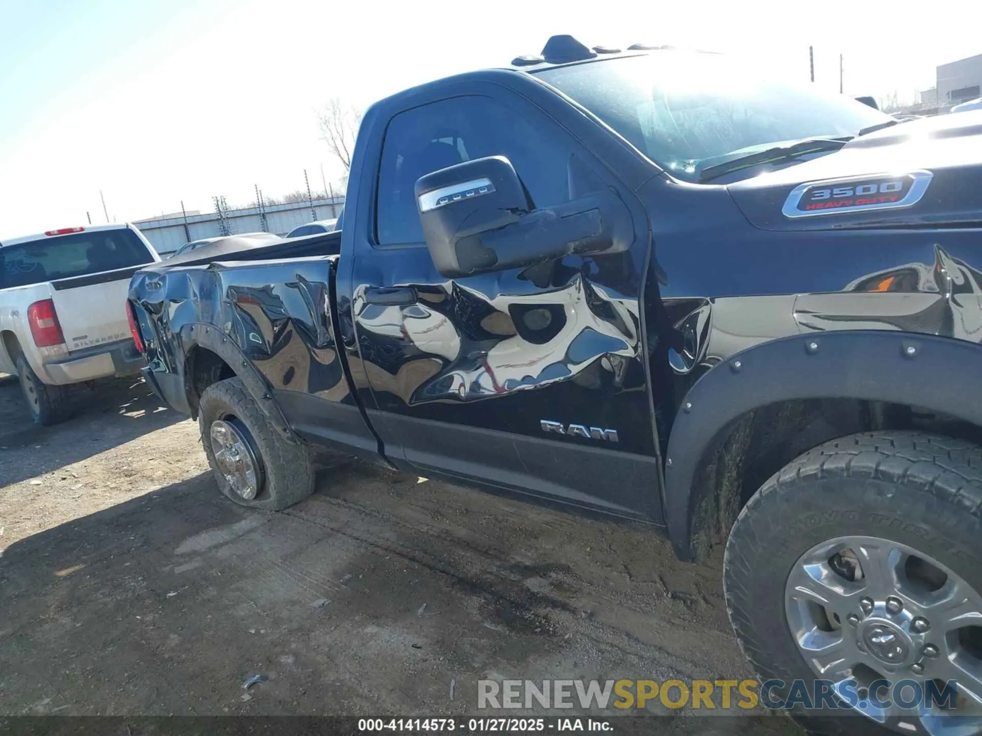 14 Photograph of a damaged car 3C63R3BJ8PG608369 RAM 3500 2023