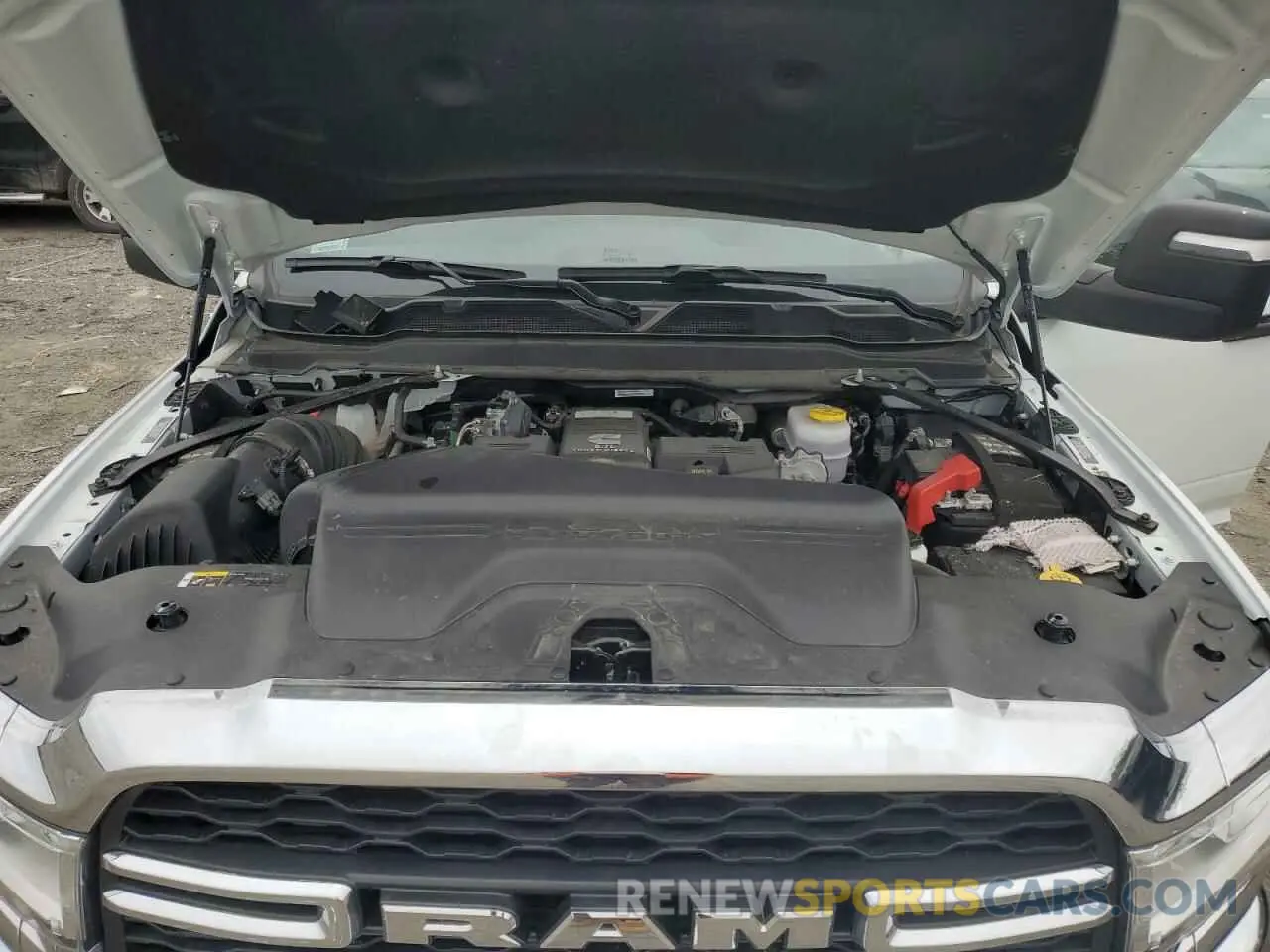 11 Photograph of a damaged car 3C63R3CL1PG648129 RAM 3500 2023