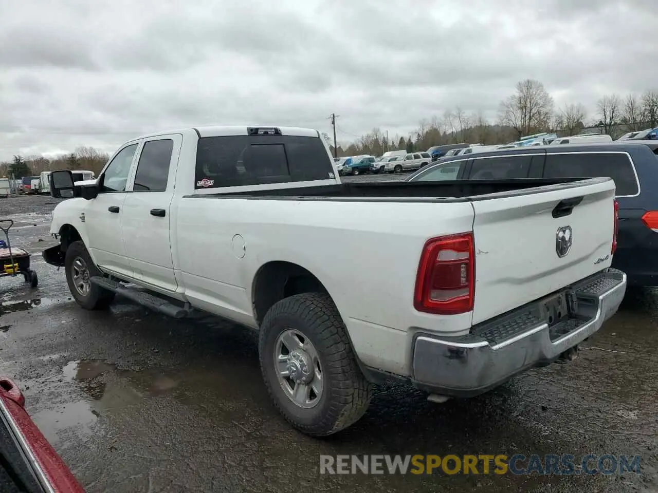 2 Photograph of a damaged car 3C63R3GL9PG623652 RAM 3500 2023