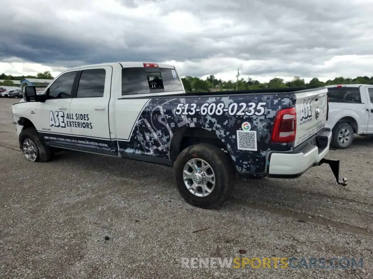2 Photograph of a damaged car 3C63R3JL7PG644055 RAM 3500 2023