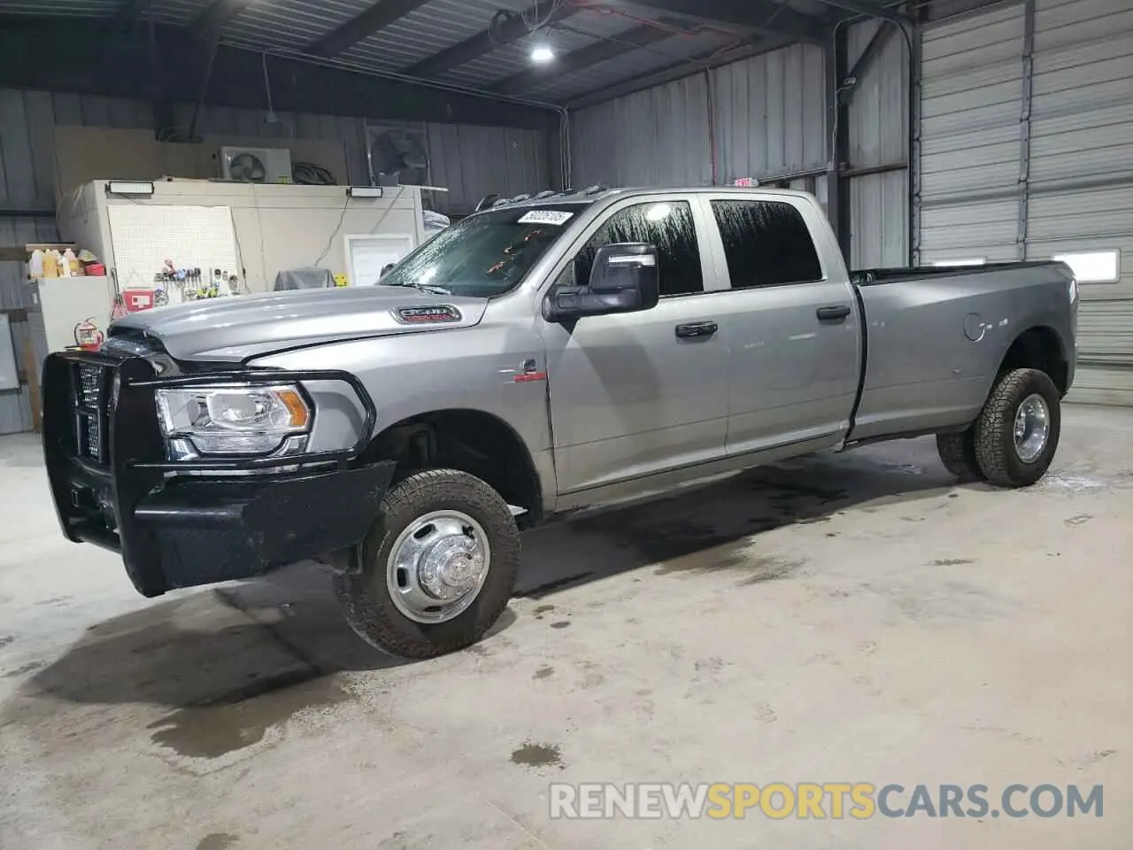 1 Photograph of a damaged car 3C63RRGL6PG578706 RAM 3500 2023