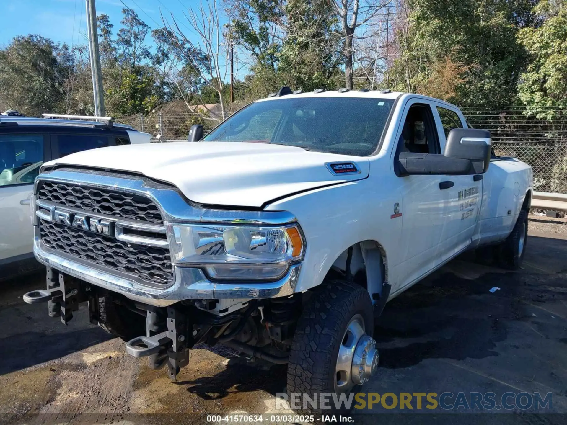2 Photograph of a damaged car 3C63RRGL6PG644915 RAM 3500 2023