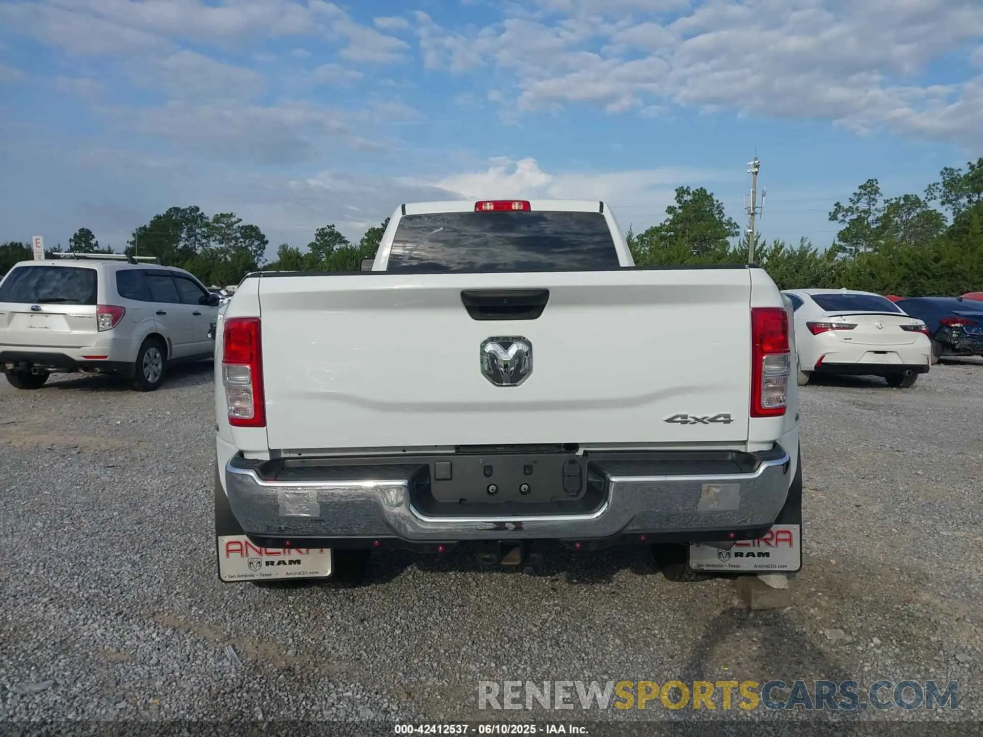 14 Photograph of a damaged car 3C63RRGL9PG623637 RAM 3500 2023