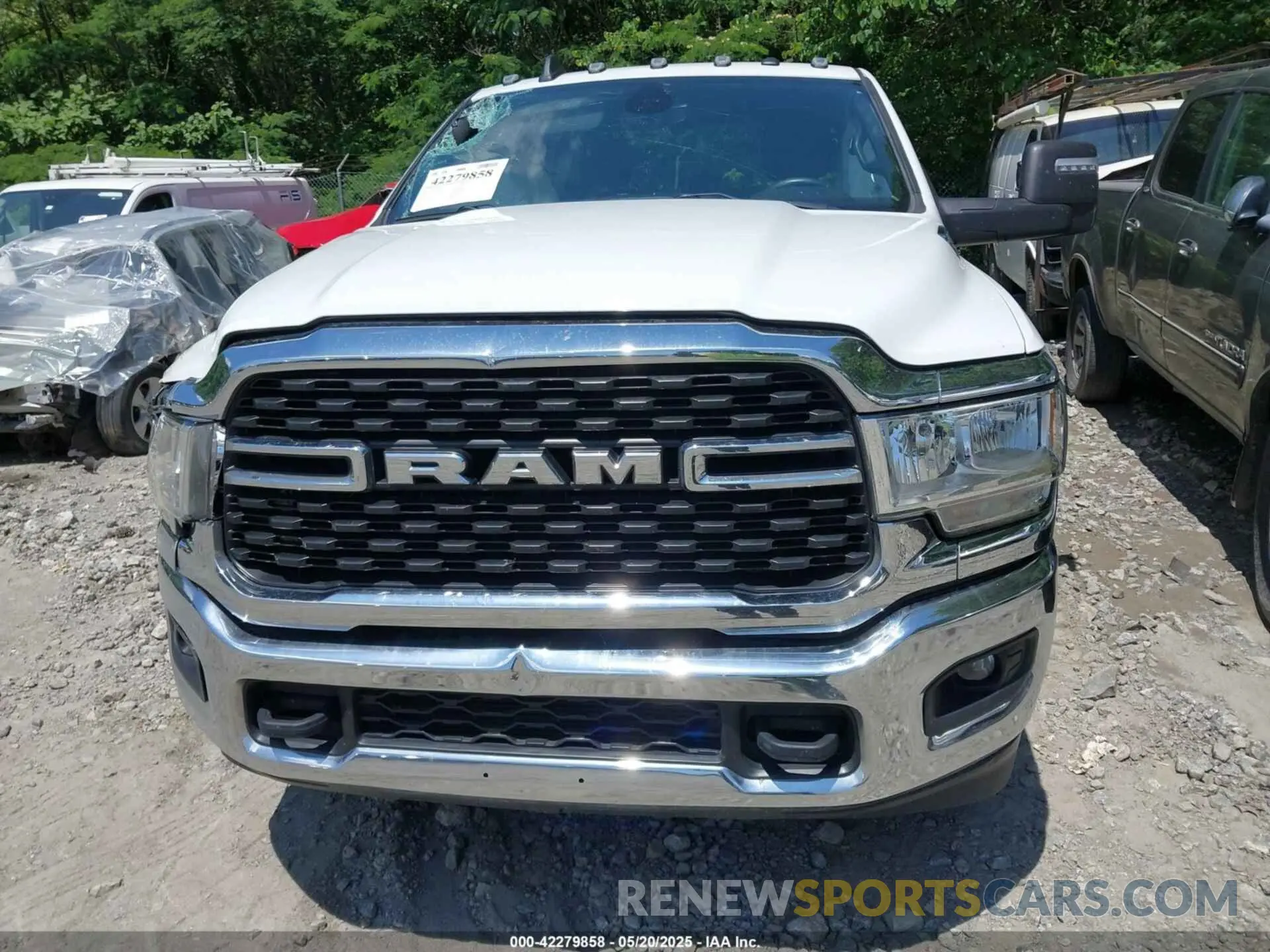 12 Photograph of a damaged car 3C63RRHL1PG578045 RAM 3500 2023