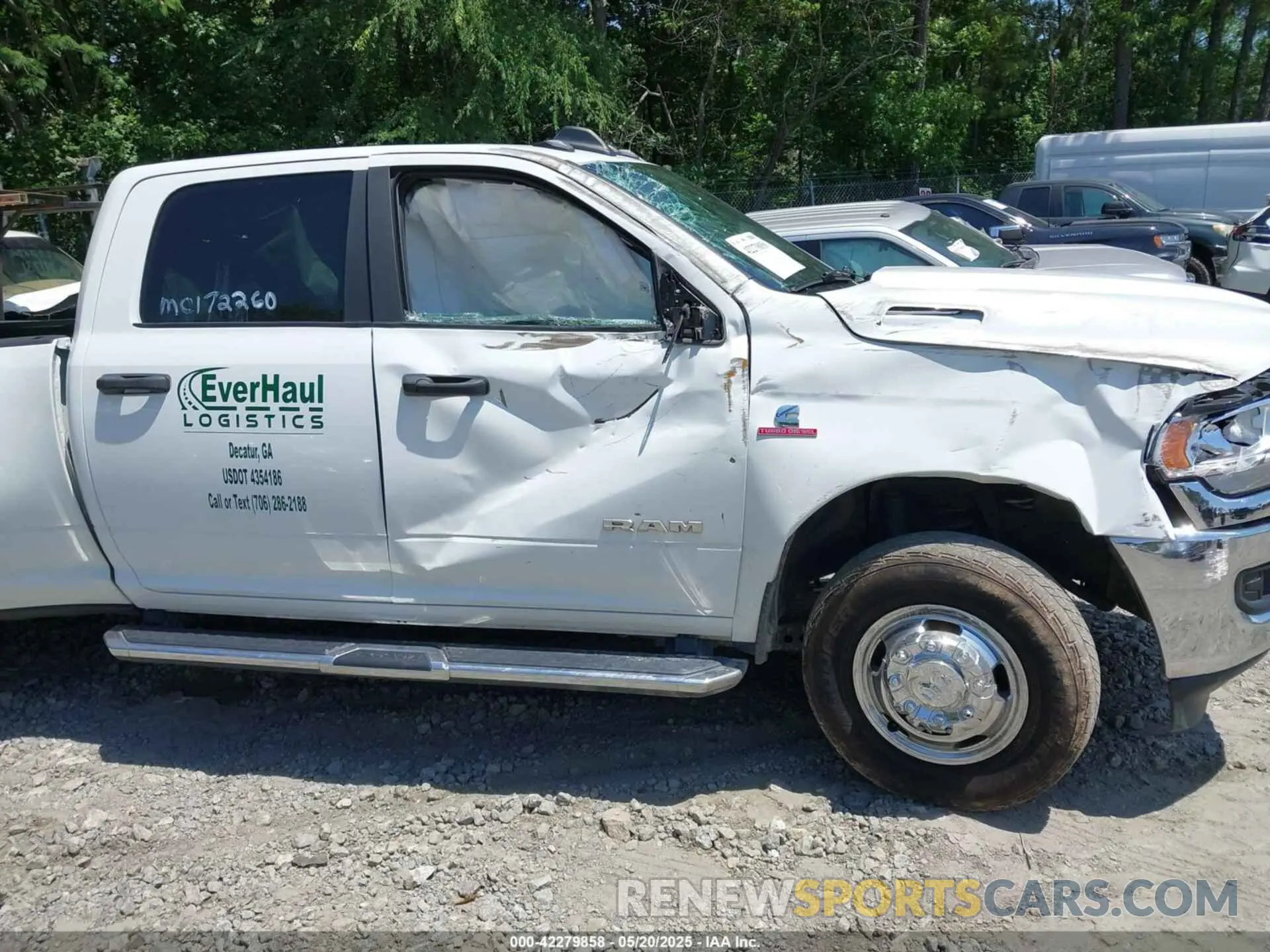 13 Photograph of a damaged car 3C63RRHL1PG578045 RAM 3500 2023