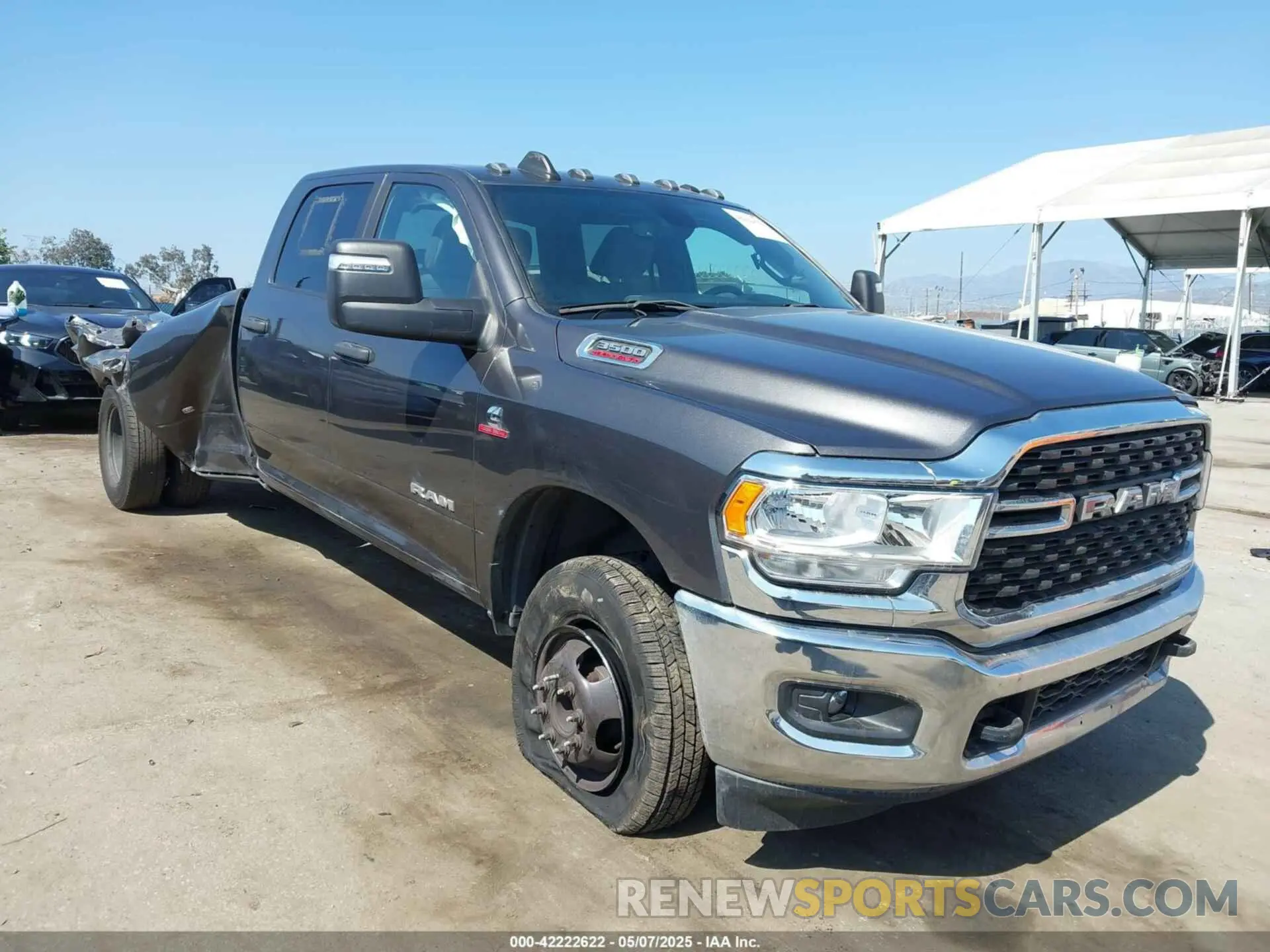 1 Photograph of a damaged car 3C63RRHL3PG542213 RAM 3500 2023