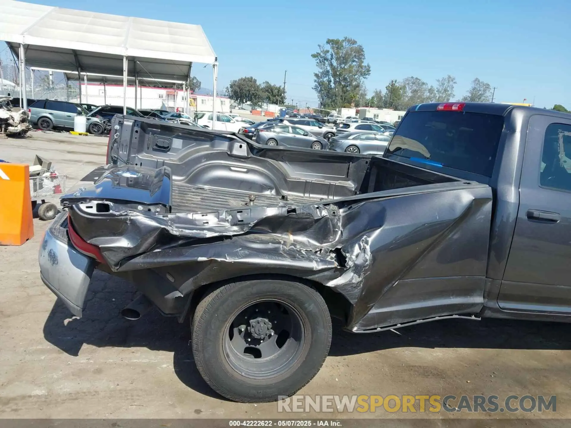 11 Photograph of a damaged car 3C63RRHL3PG542213 RAM 3500 2023