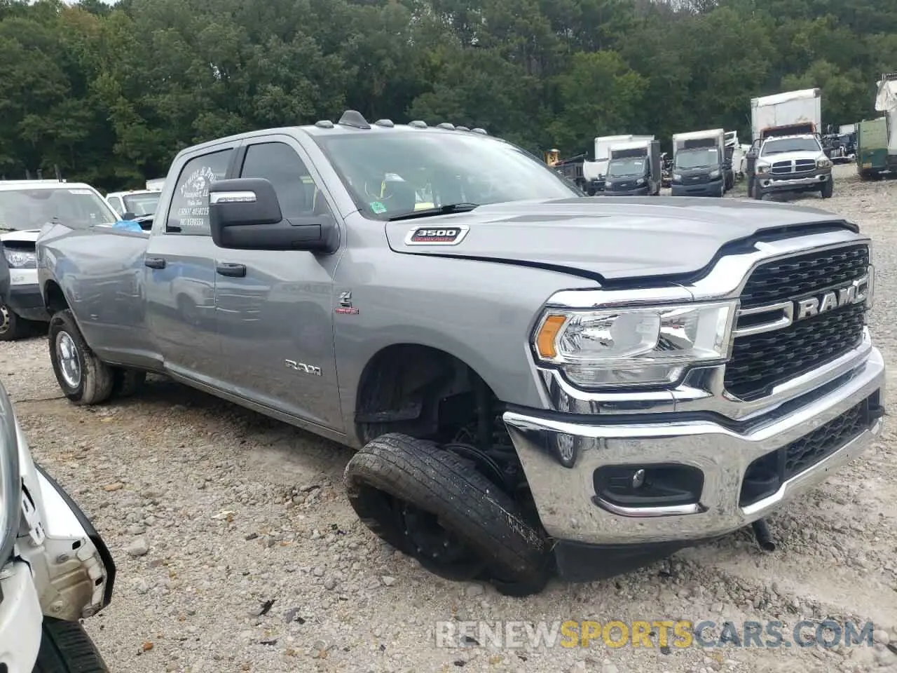 1 Photograph of a damaged car 3C63RRHL6PG573858 RAM 3500 2023