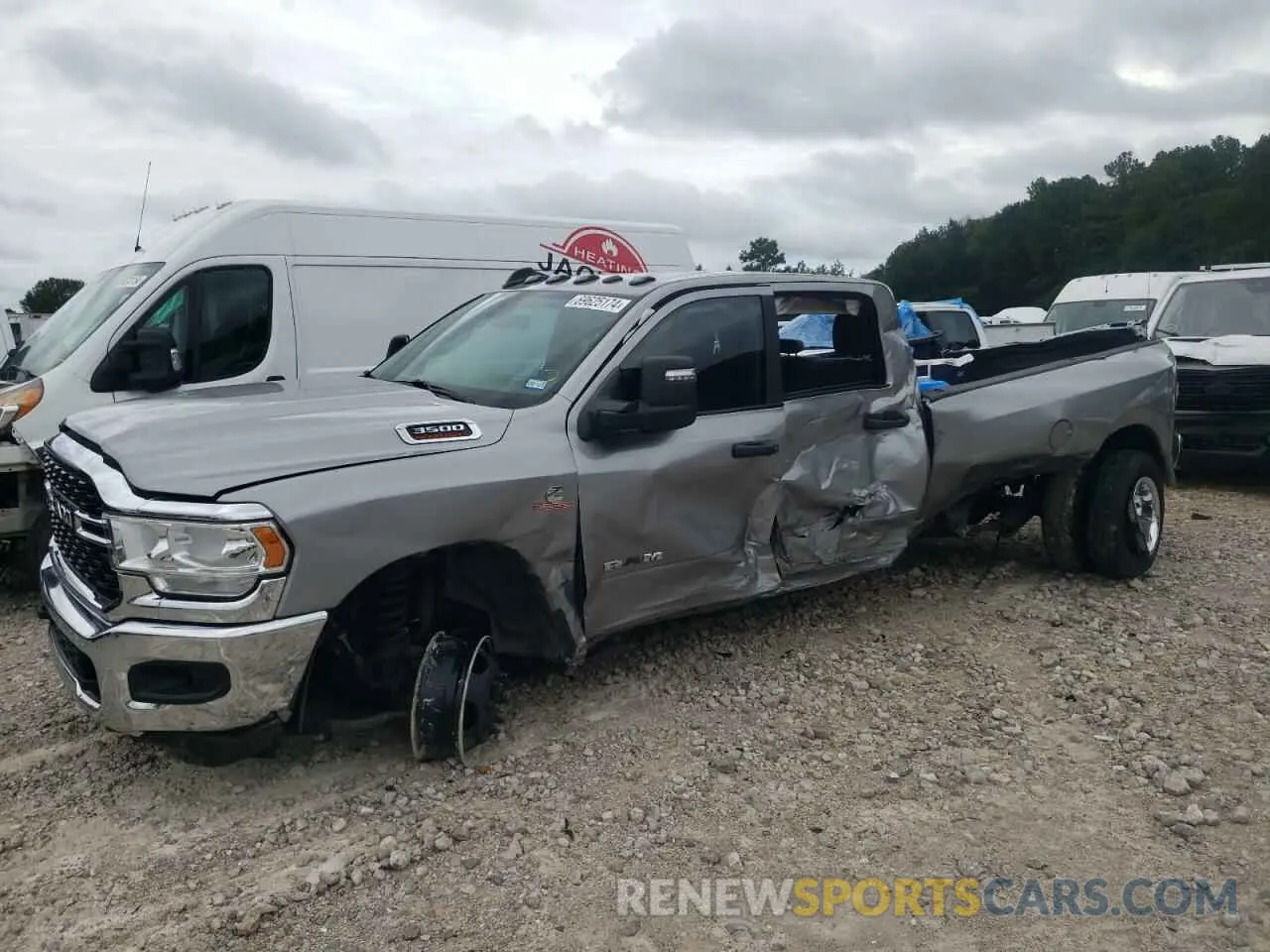 2 Photograph of a damaged car 3C63RRHL6PG573858 RAM 3500 2023