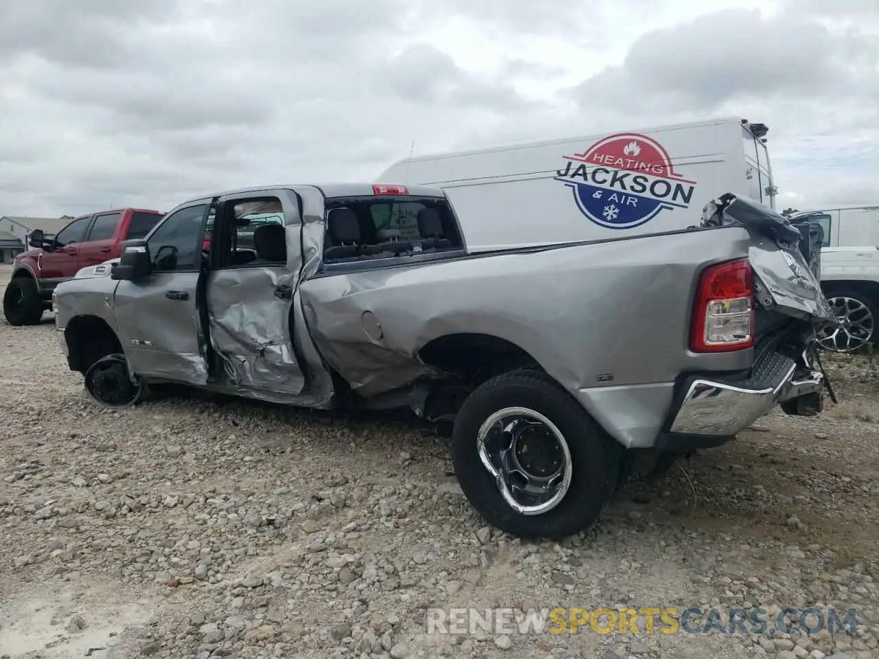 3 Photograph of a damaged car 3C63RRHL6PG573858 RAM 3500 2023