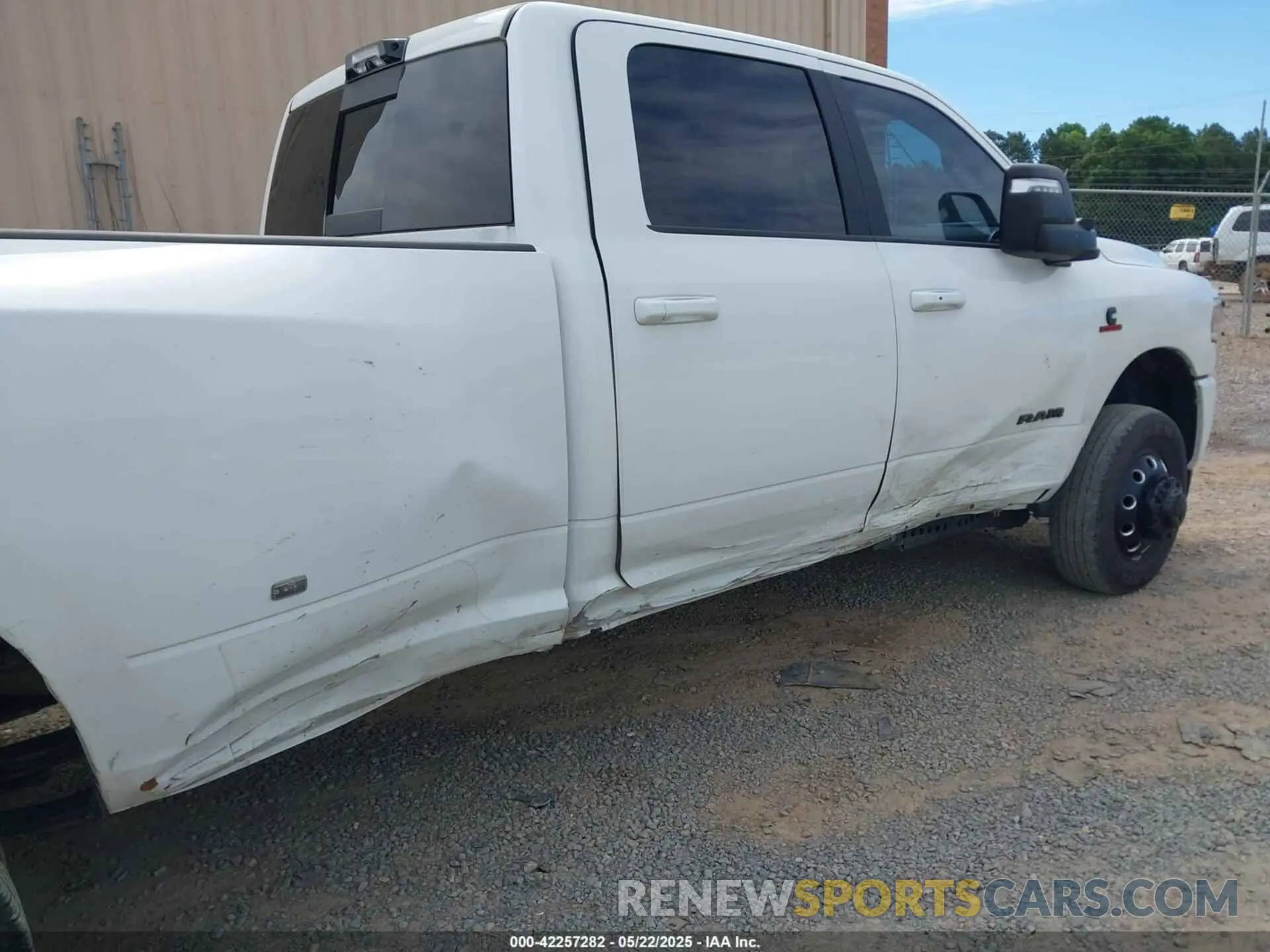 11 Photograph of a damaged car 3C63RRJL1PG509172 RAM 3500 2023