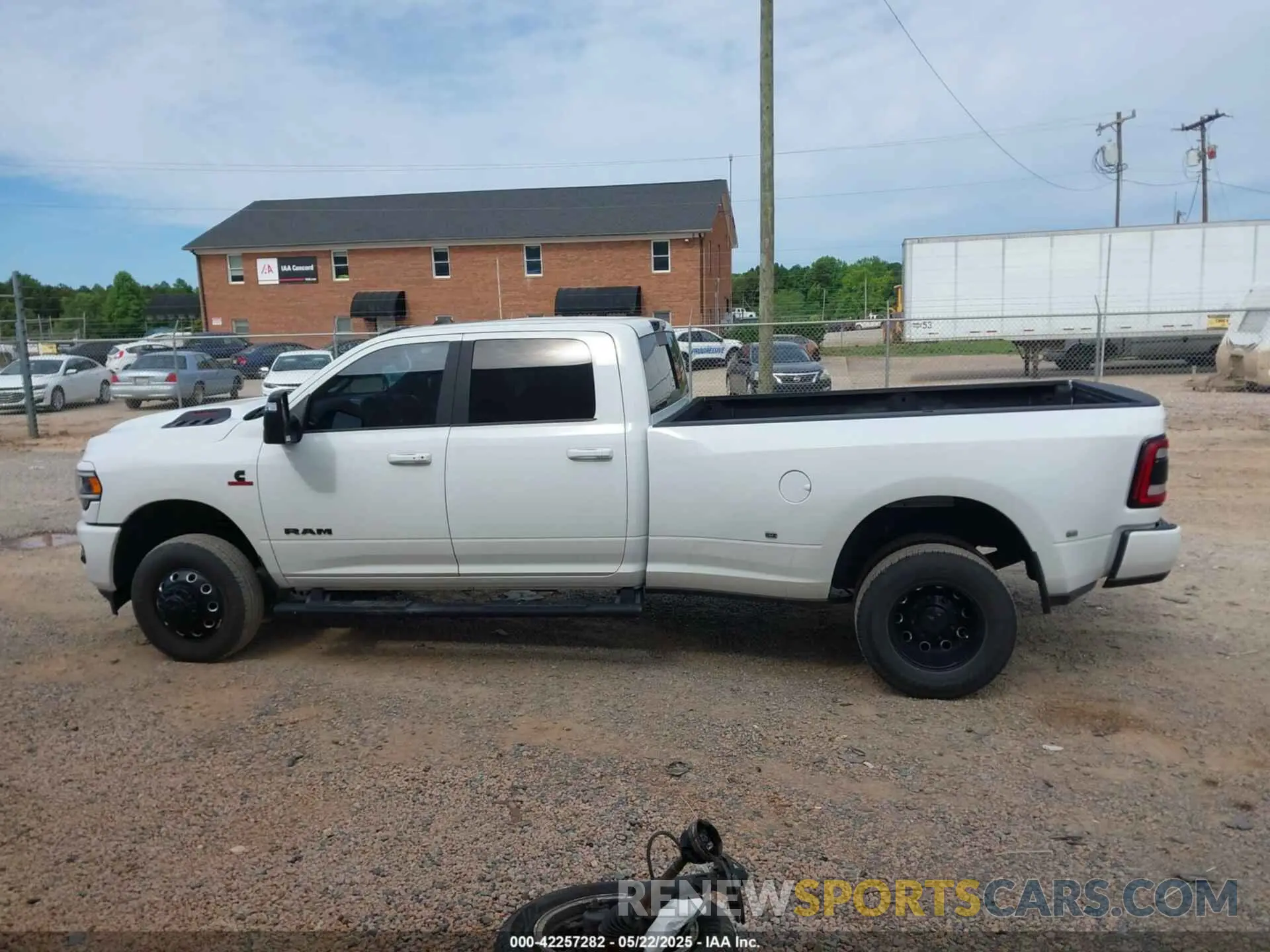 15 Photograph of a damaged car 3C63RRJL1PG509172 RAM 3500 2023