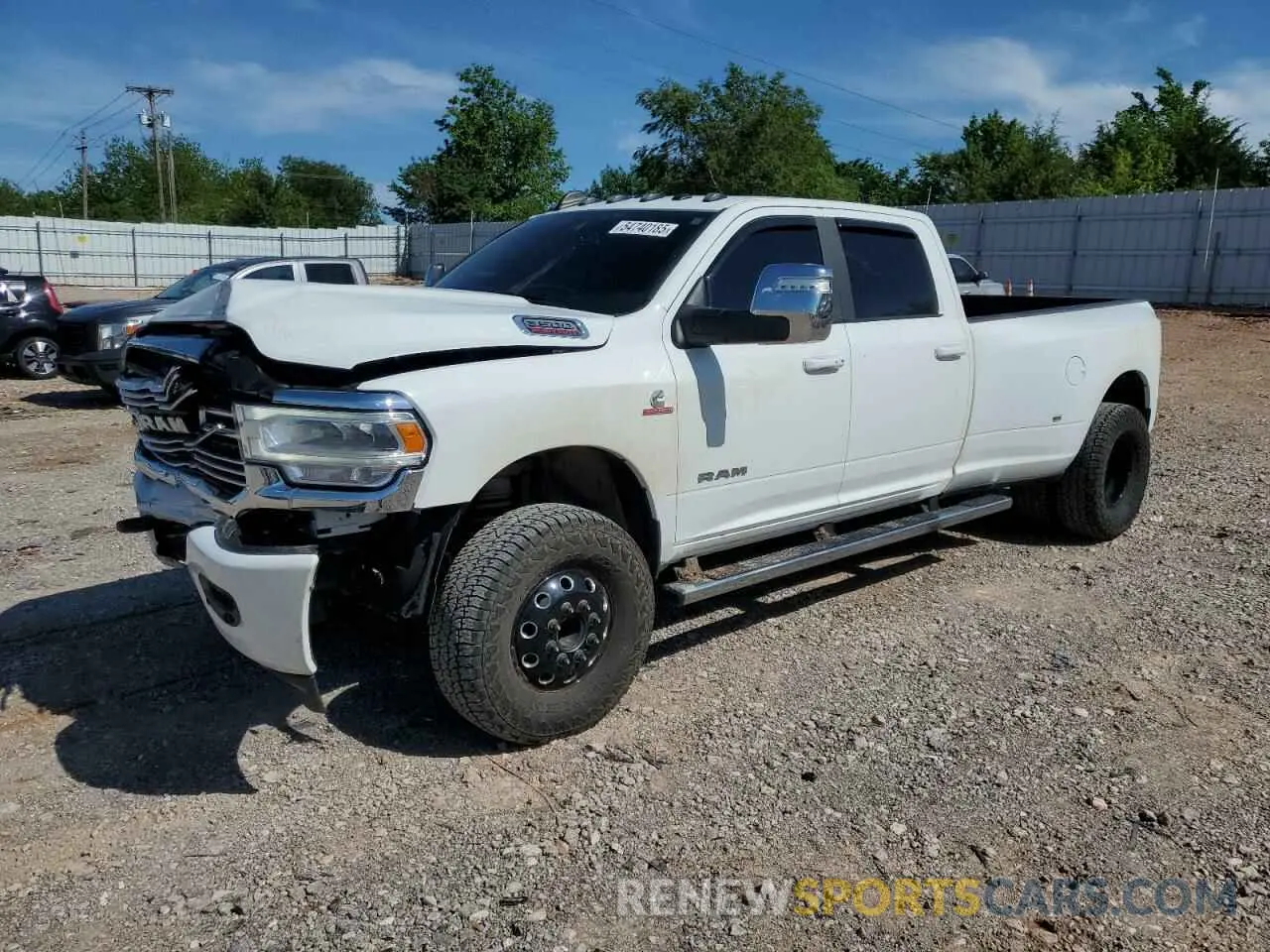 1 Photograph of a damaged car 3C63RRJL1PG630400 RAM 3500 2023