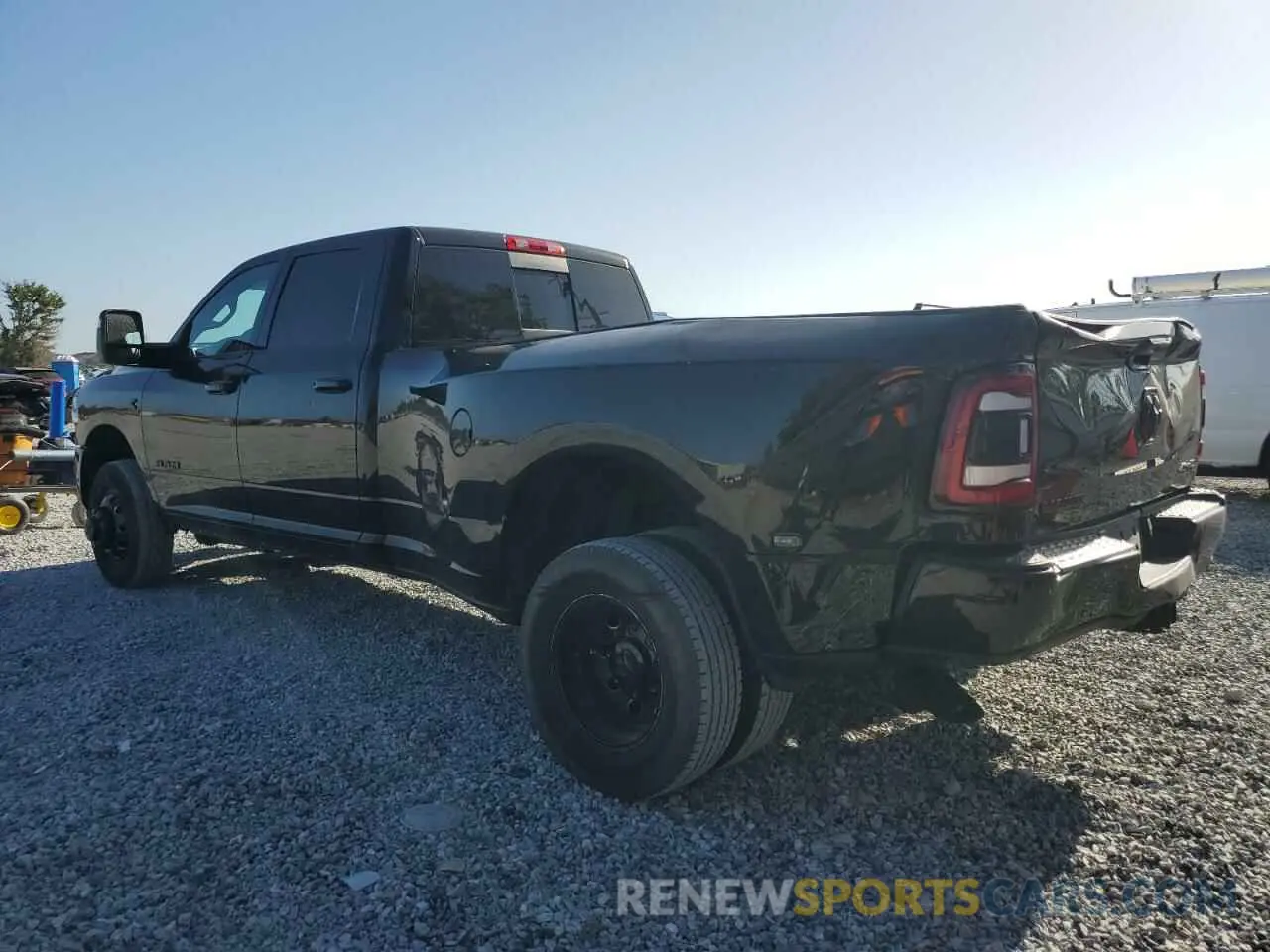 2 Photograph of a damaged car 3C63RRJL6PG508583 RAM 3500 2023