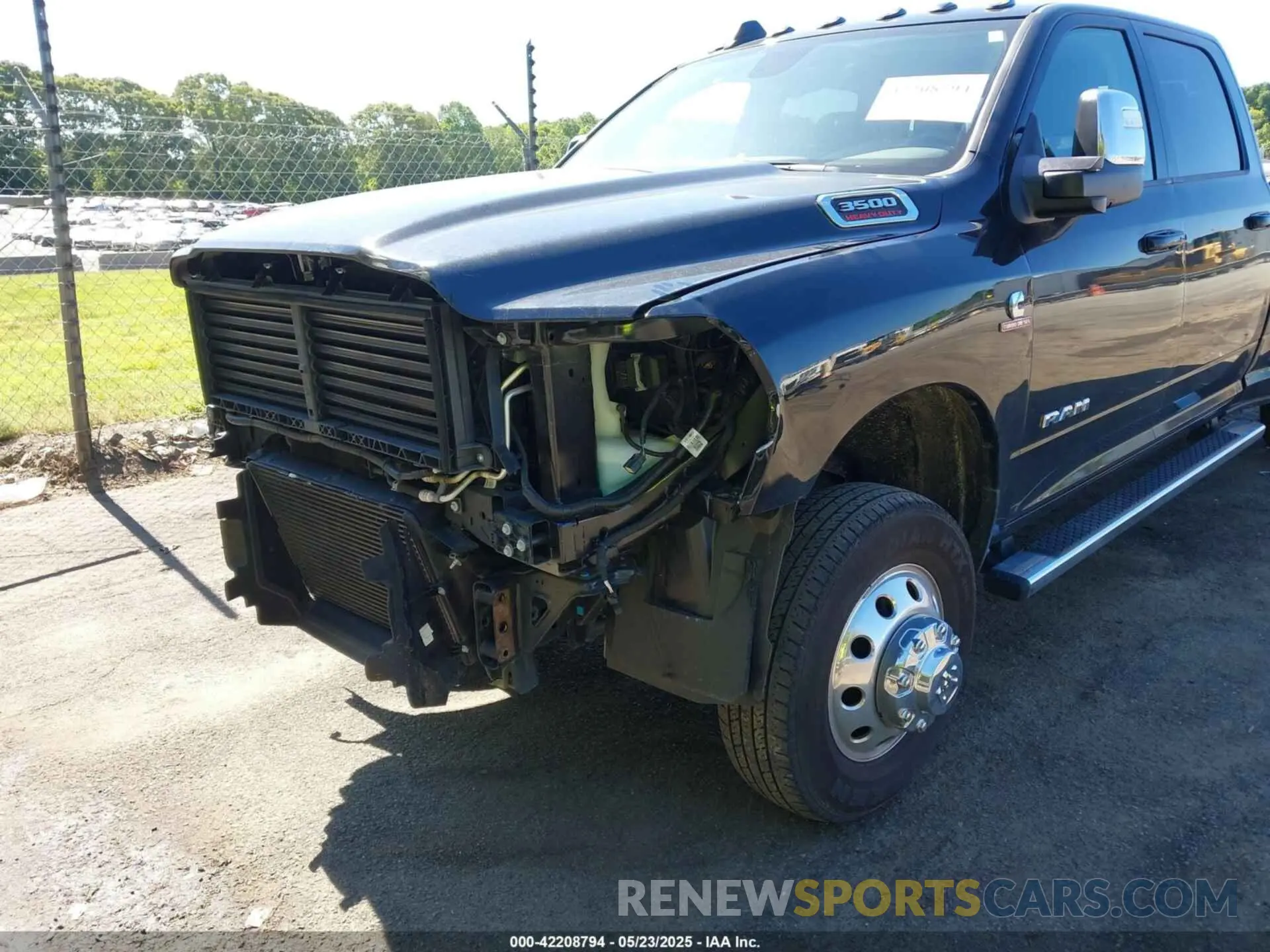 11 Photograph of a damaged car 3C63RRJL7PG521813 RAM 3500 2023