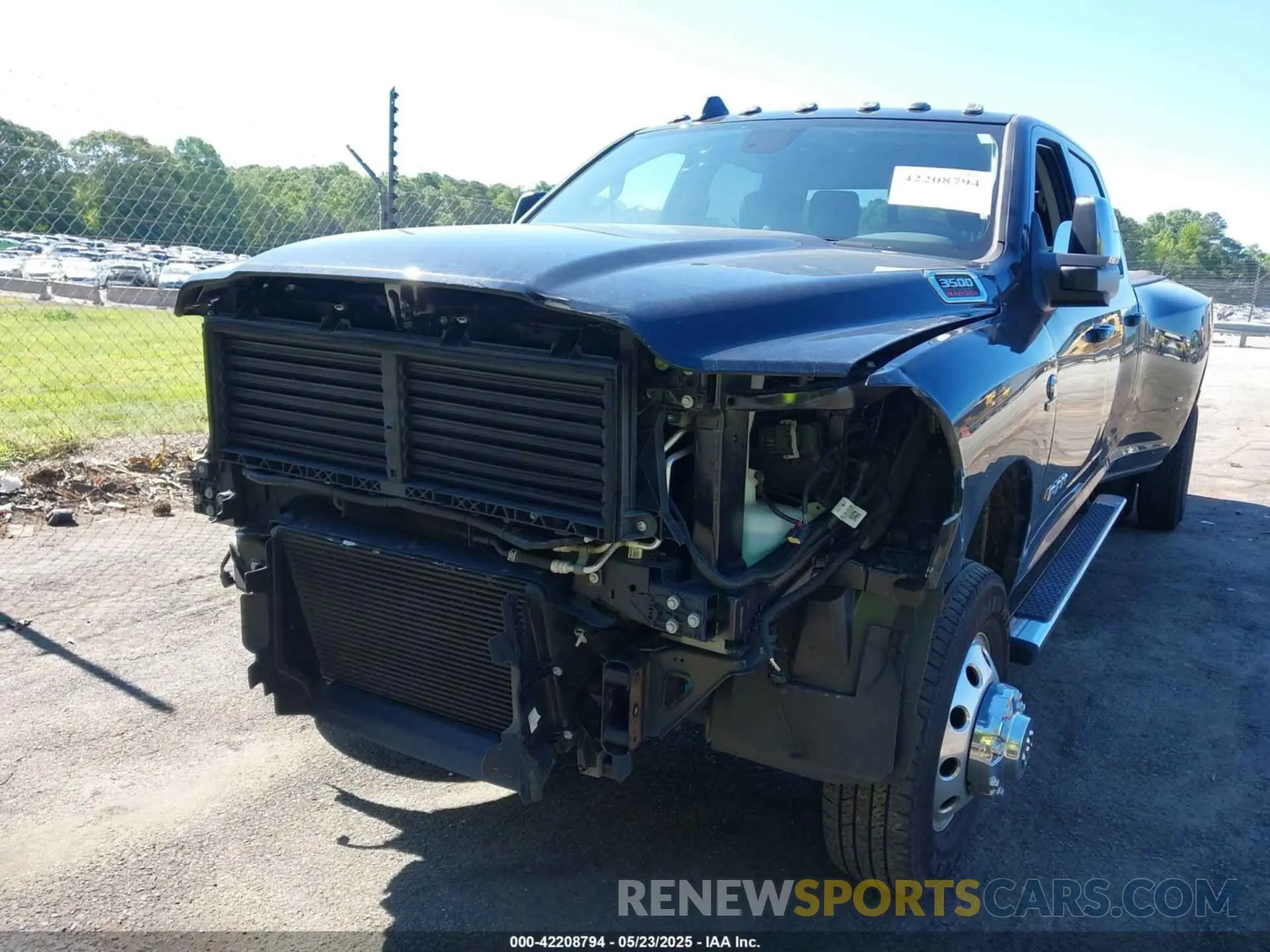 12 Photograph of a damaged car 3C63RRJL7PG521813 RAM 3500 2023