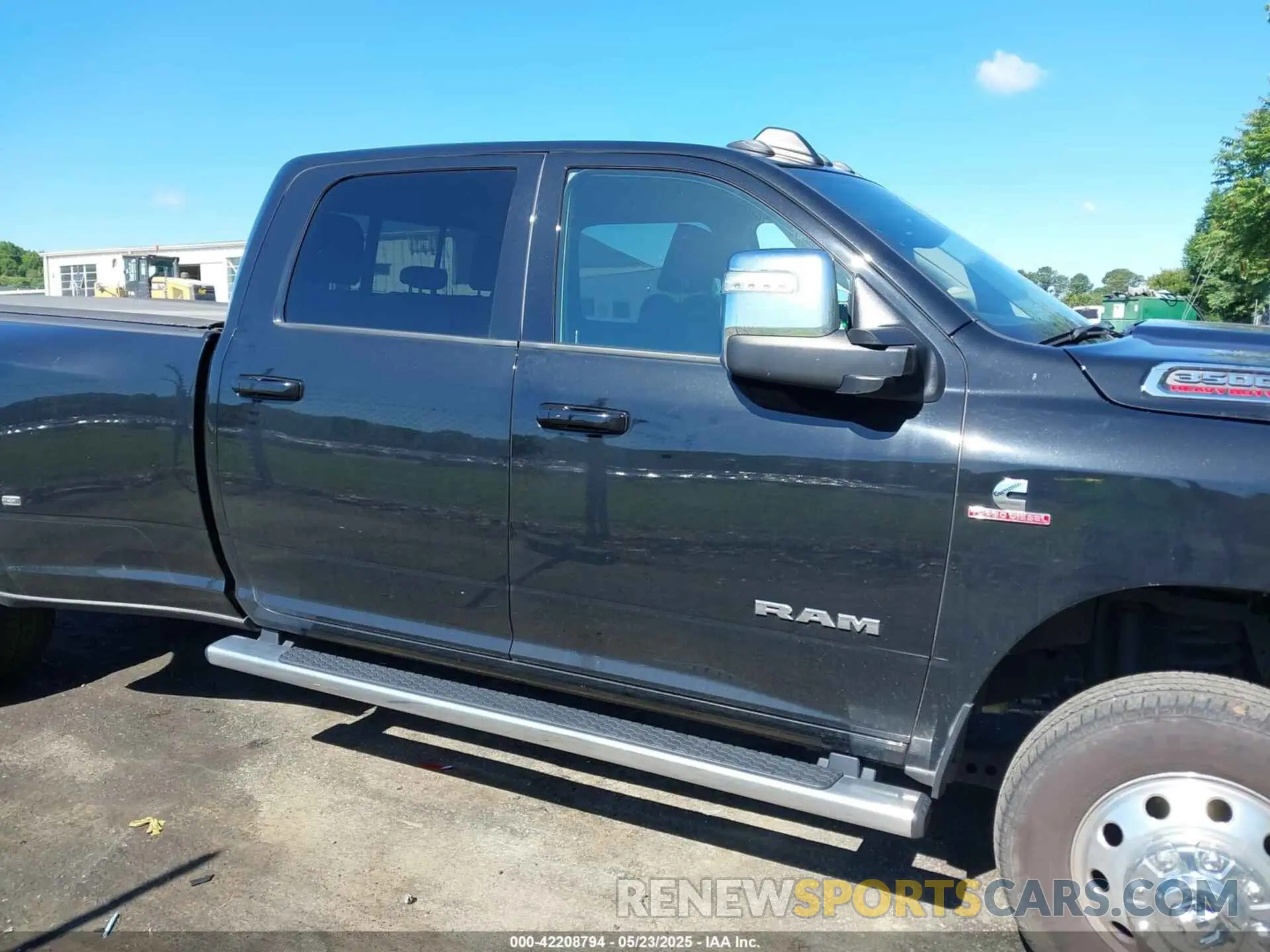 13 Photograph of a damaged car 3C63RRJL7PG521813 RAM 3500 2023