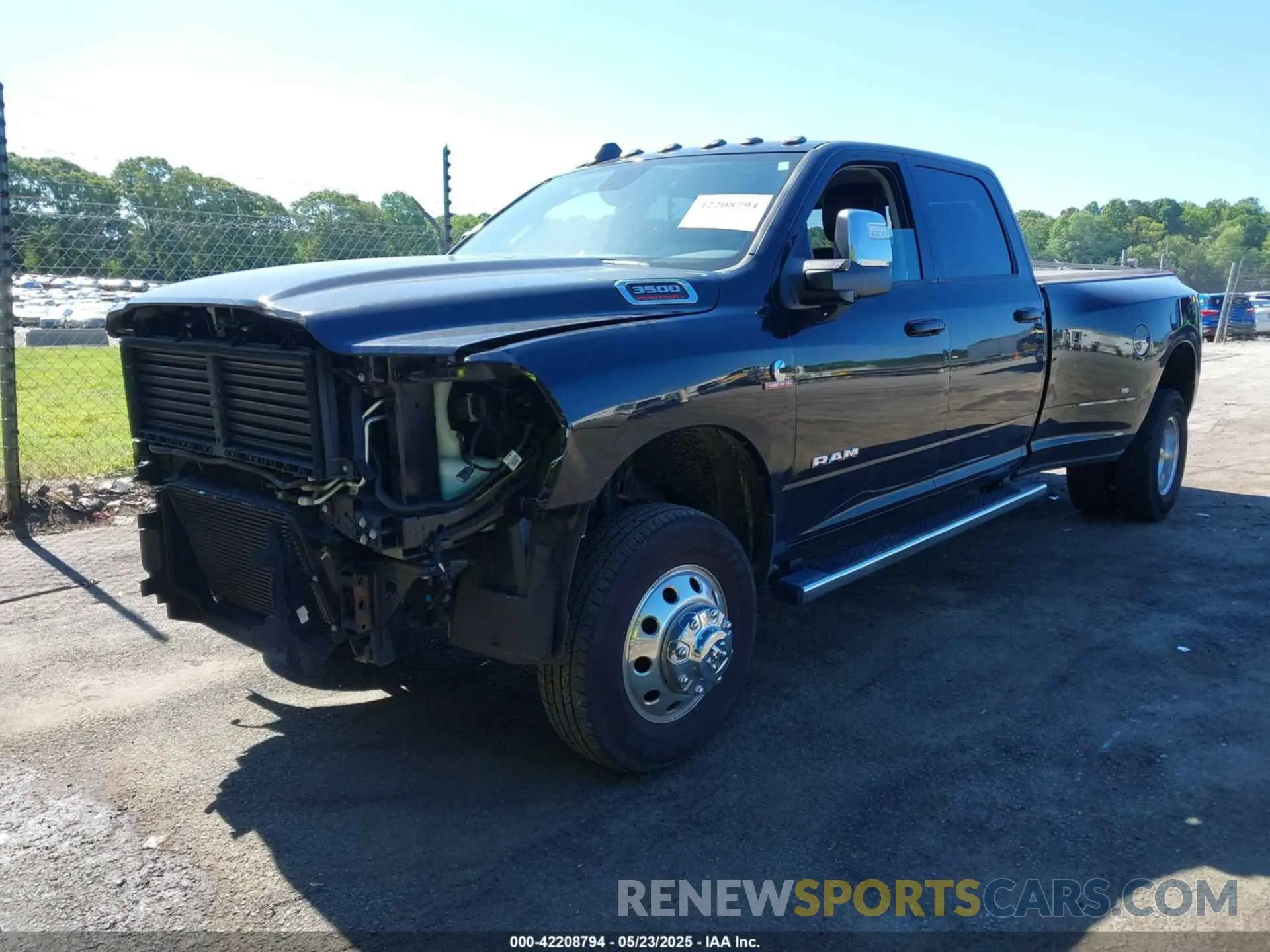 2 Photograph of a damaged car 3C63RRJL7PG521813 RAM 3500 2023