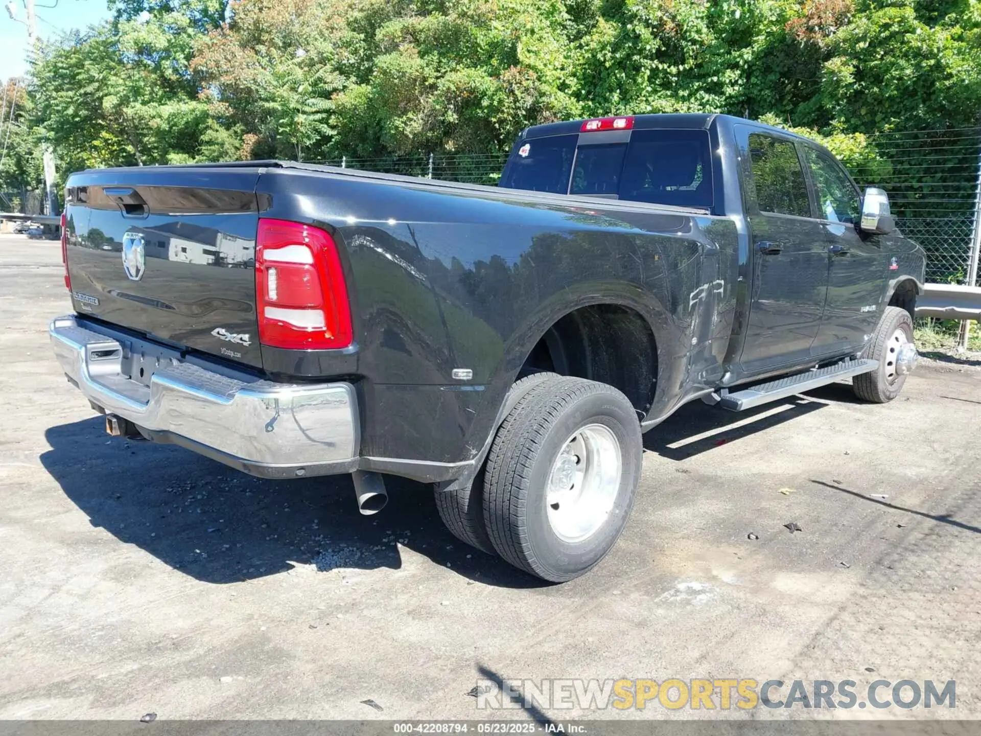 4 Photograph of a damaged car 3C63RRJL7PG521813 RAM 3500 2023