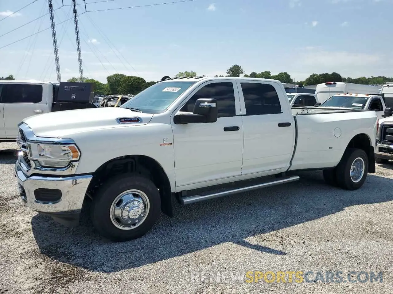 1 Photograph of a damaged car 3C63RRJL7PG627937 RAM 3500 2023