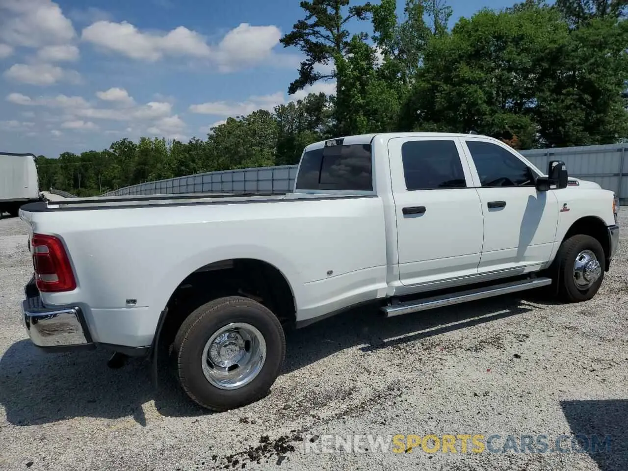 3 Photograph of a damaged car 3C63RRJL7PG627937 RAM 3500 2023