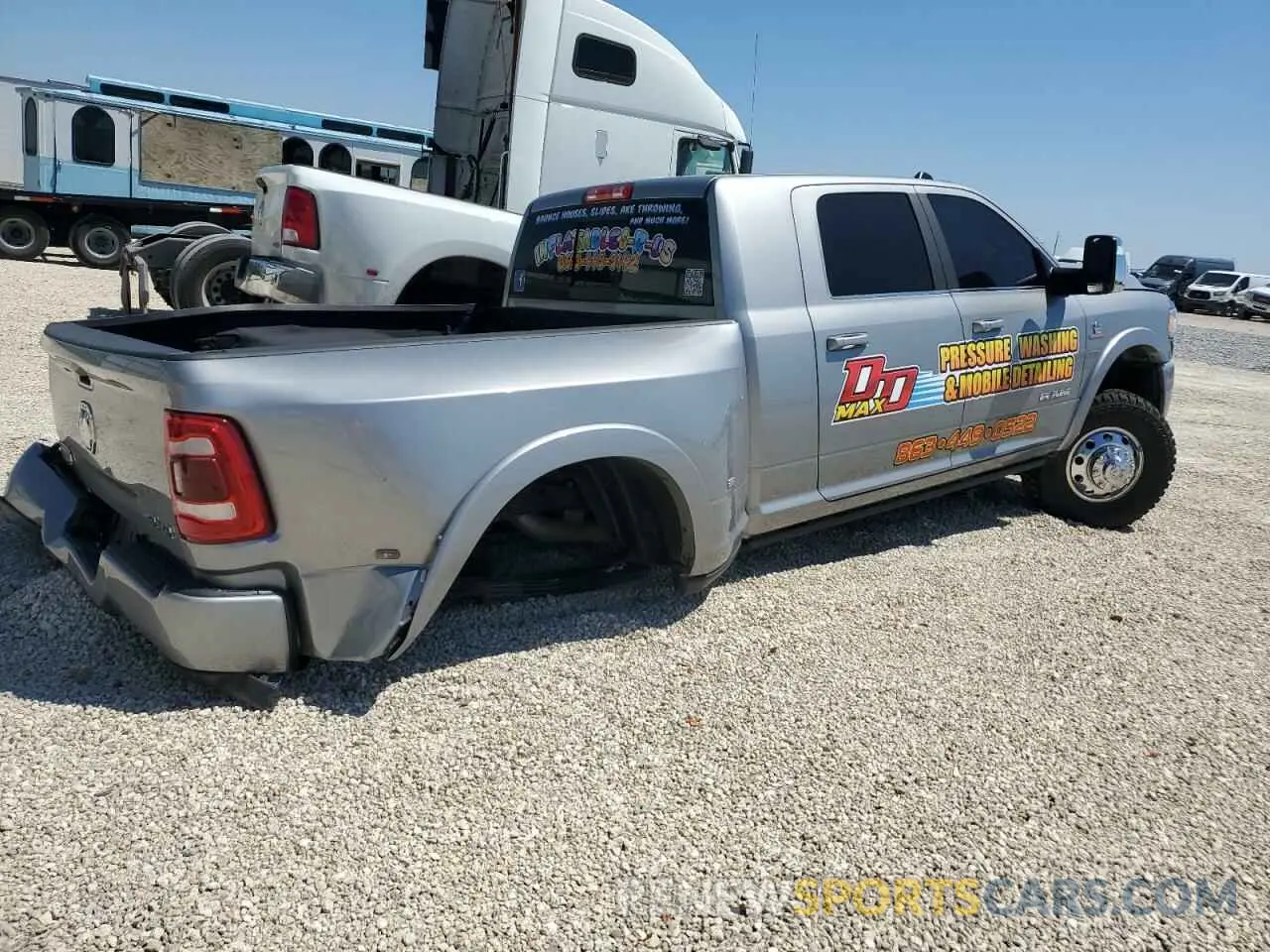 3 Photograph of a damaged car 3C63RRNL2PG623661 RAM 3500 2023