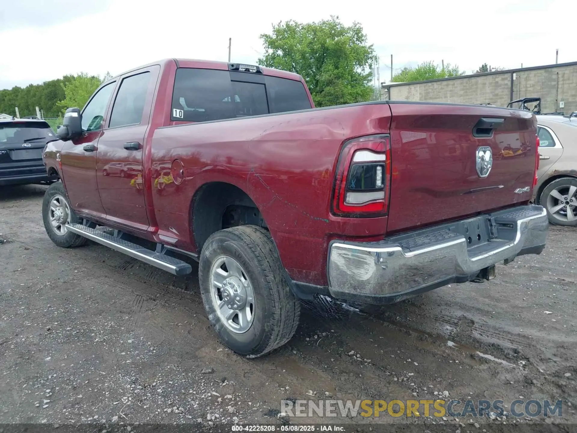 3 Photograph of a damaged car 3C63R3CL0RG148384 RAM 3500 2024