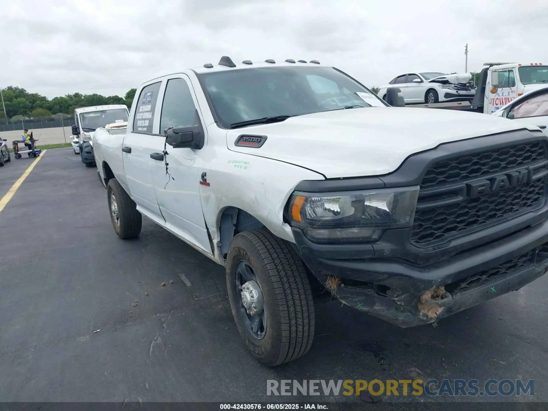 11 Photograph of a damaged car 3C63R3CL4RG380261 RAM 3500 2024