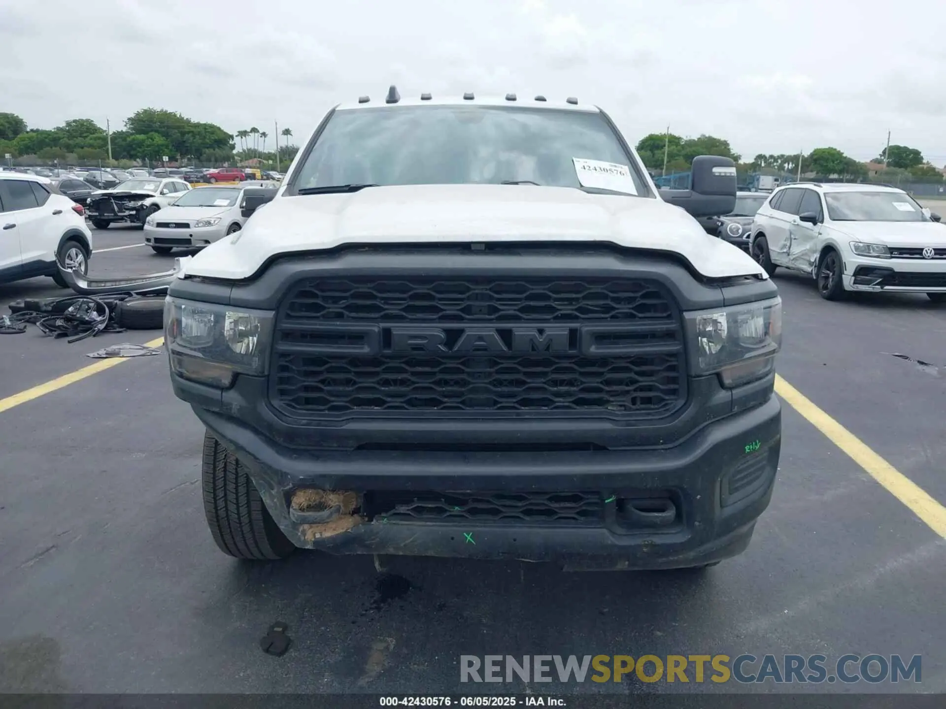 13 Photograph of a damaged car 3C63R3CL4RG380261 RAM 3500 2024