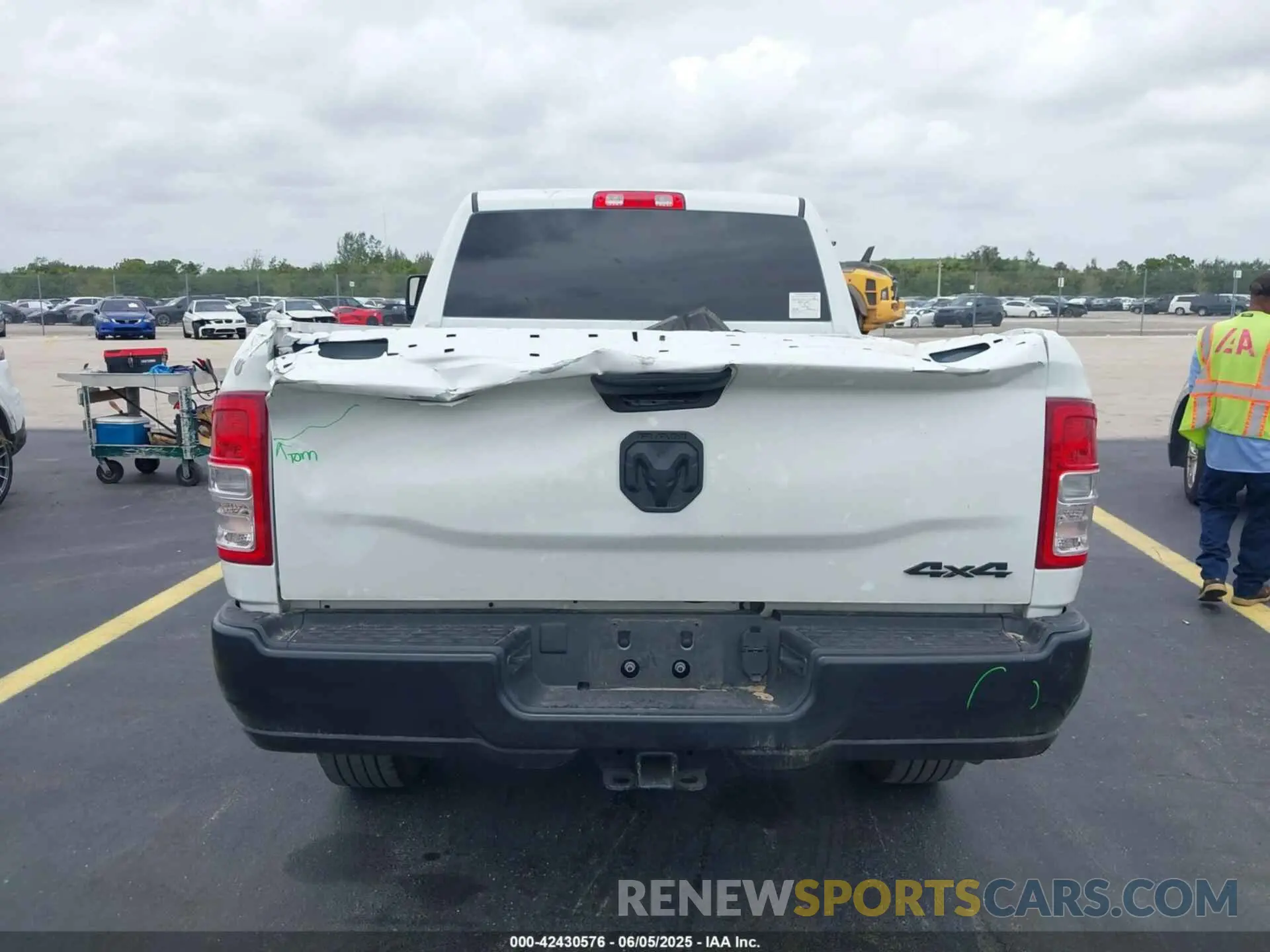 16 Photograph of a damaged car 3C63R3CL4RG380261 RAM 3500 2024