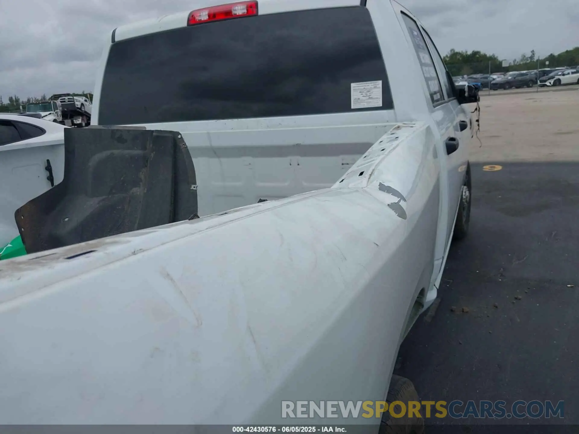 17 Photograph of a damaged car 3C63R3CL4RG380261 RAM 3500 2024