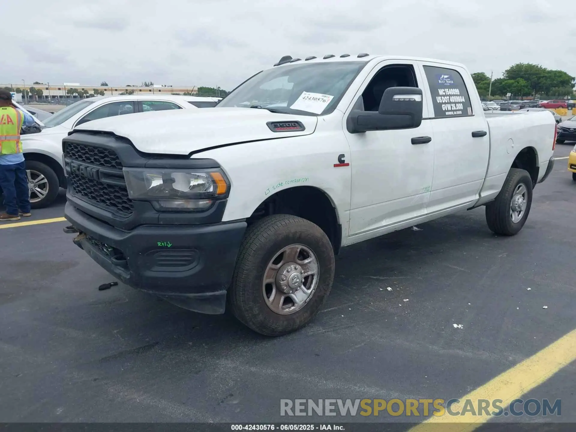 2 Photograph of a damaged car 3C63R3CL4RG380261 RAM 3500 2024