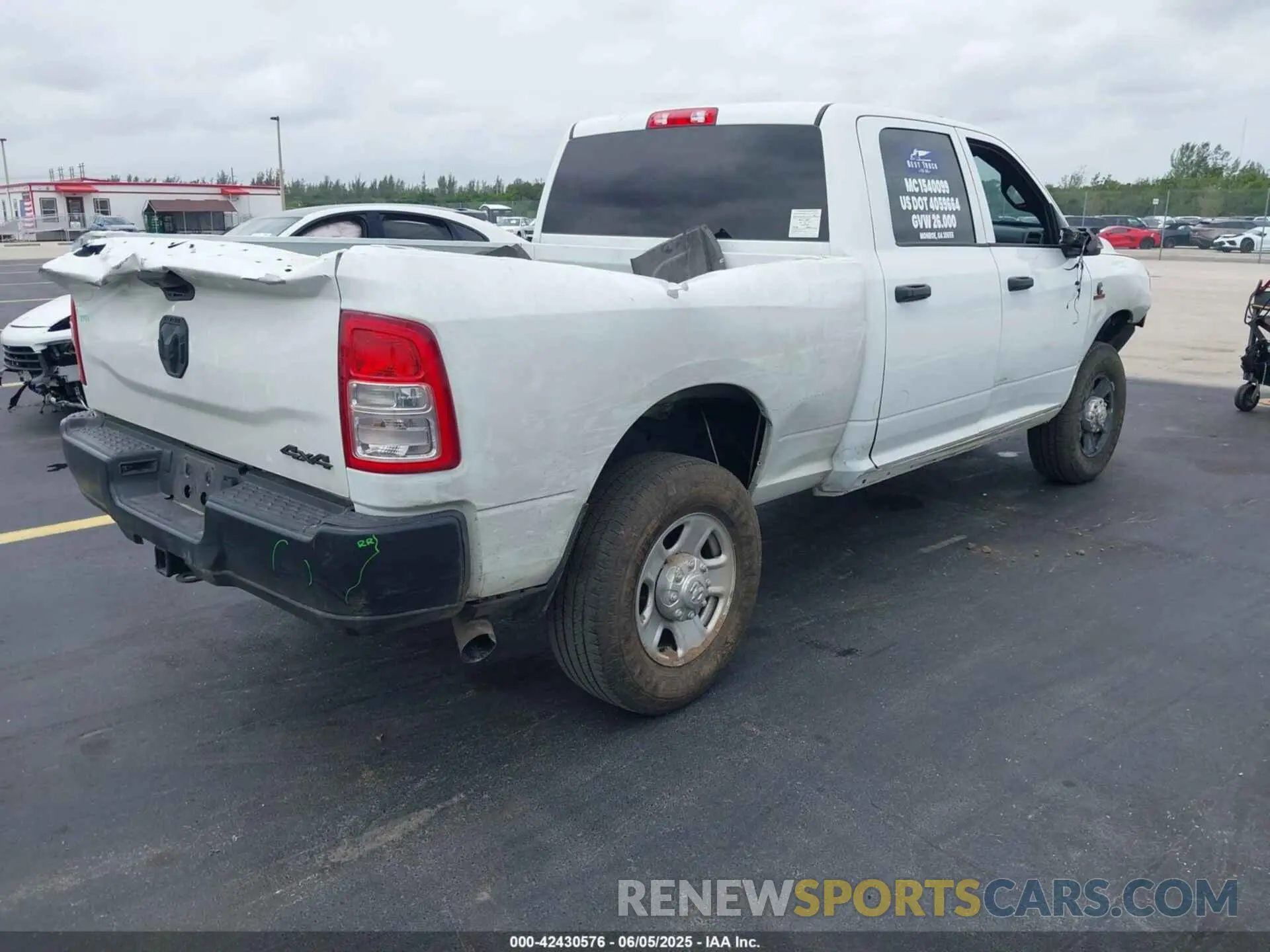 4 Photograph of a damaged car 3C63R3CL4RG380261 RAM 3500 2024