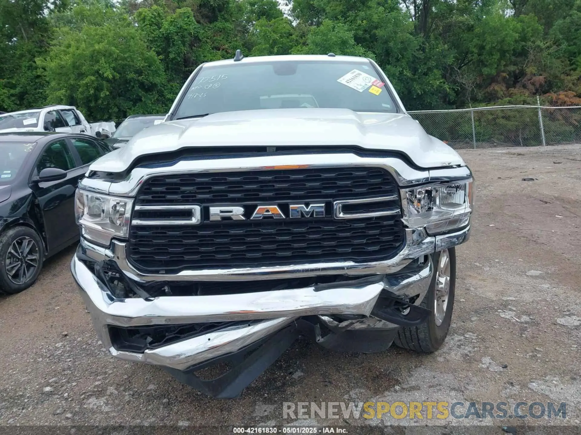 12 Photograph of a damaged car 3C63R3HL0RG339151 RAM 3500 2024