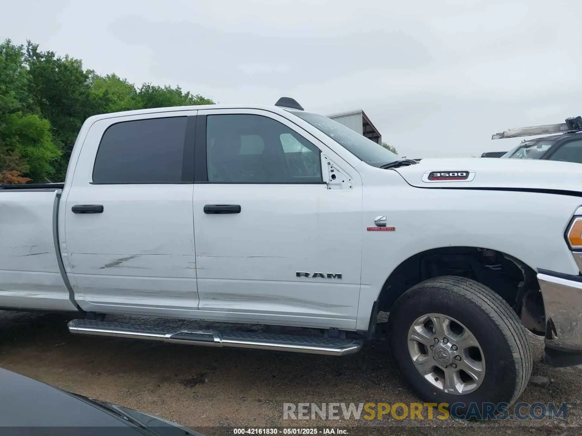 13 Photograph of a damaged car 3C63R3HL0RG339151 RAM 3500 2024