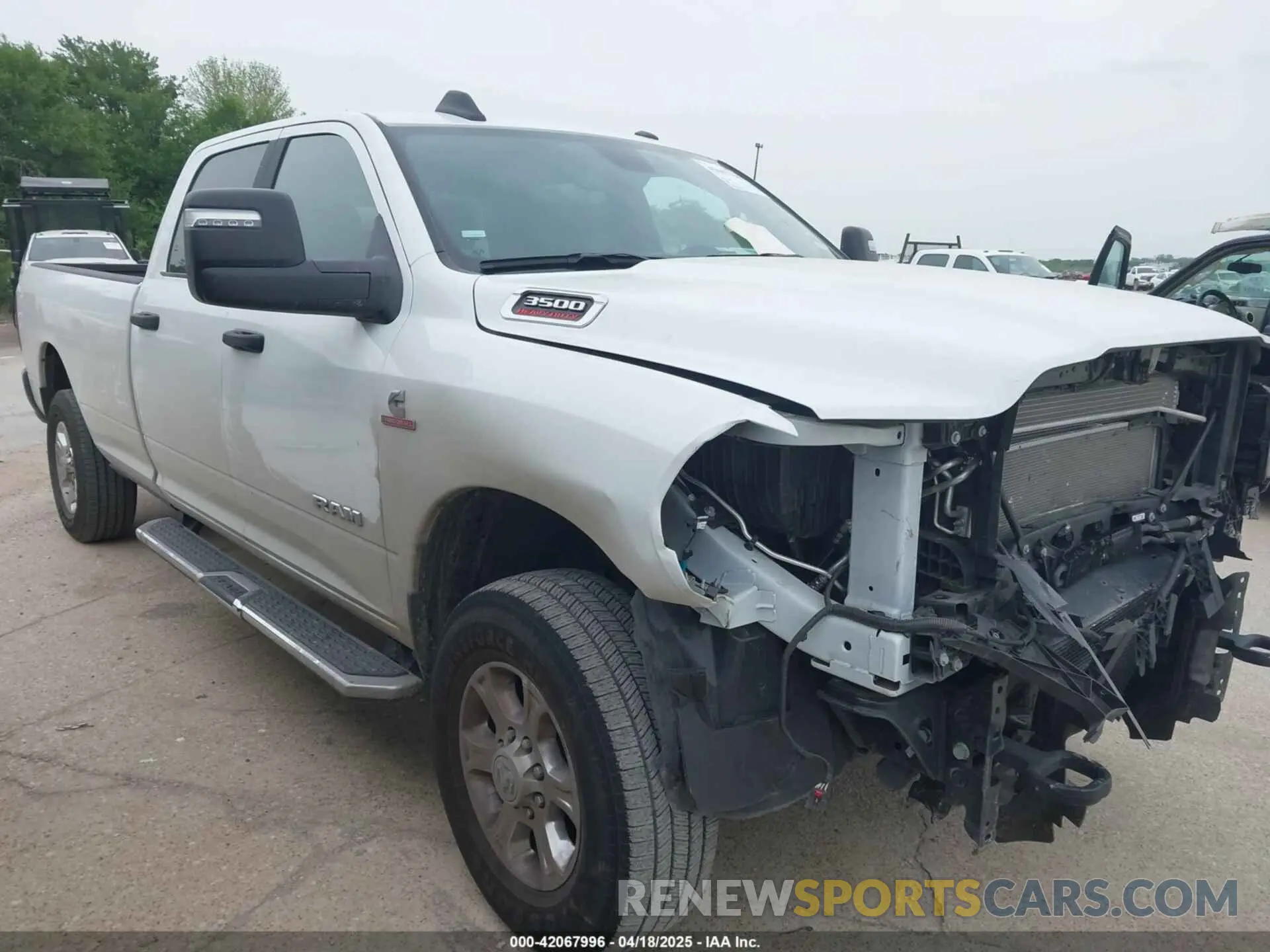 1 Photograph of a damaged car 3C63R3HL0RG358136 RAM 3500 2024