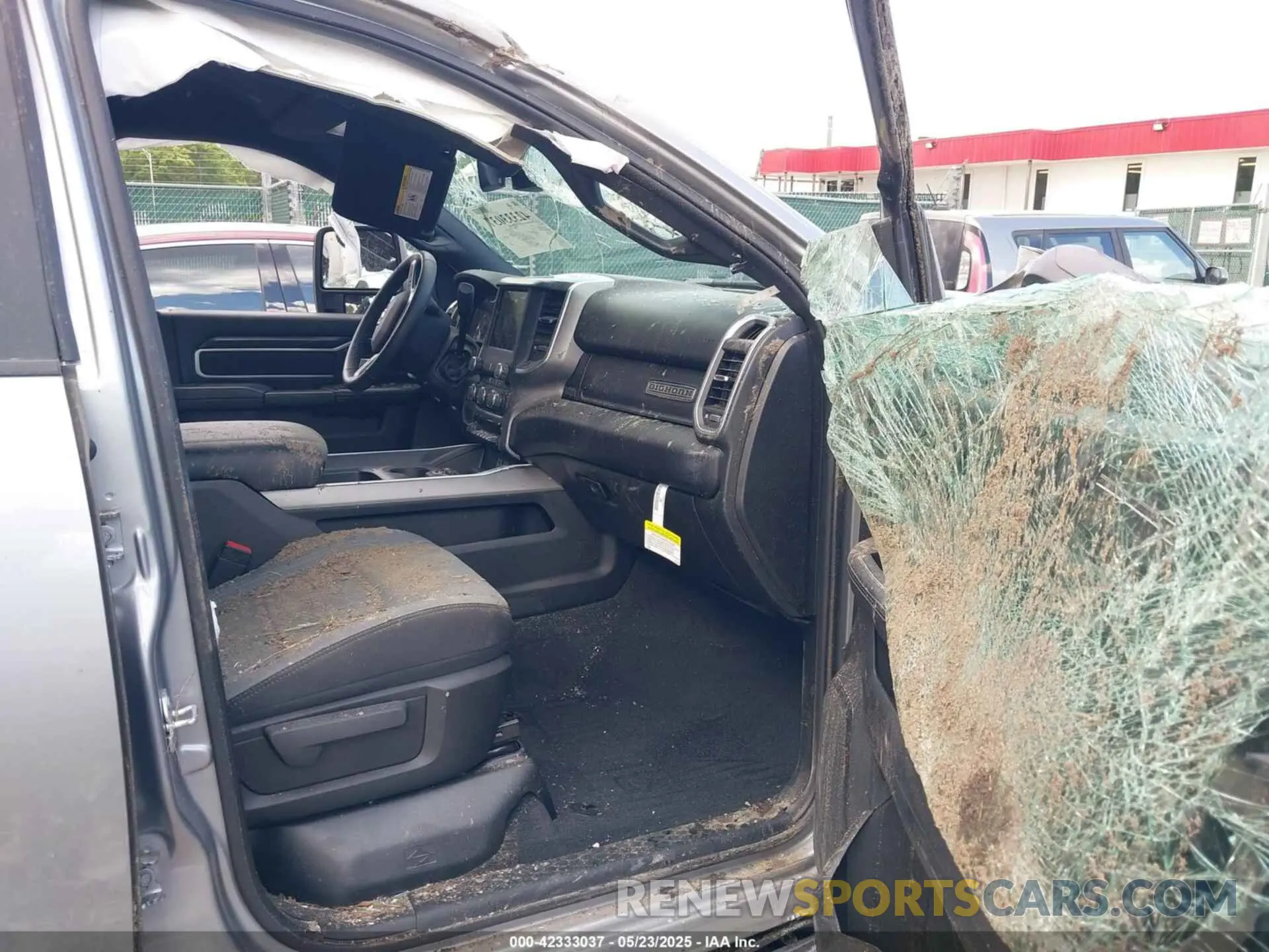 13 Photograph of a damaged car 3C63R3HL1RG198705 RAM 3500 2024