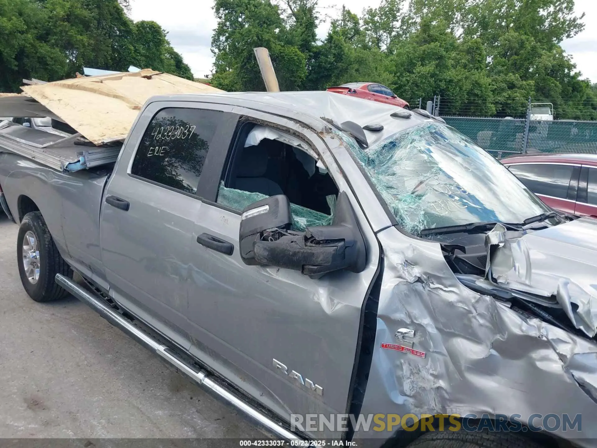 19 Photograph of a damaged car 3C63R3HL1RG198705 RAM 3500 2024