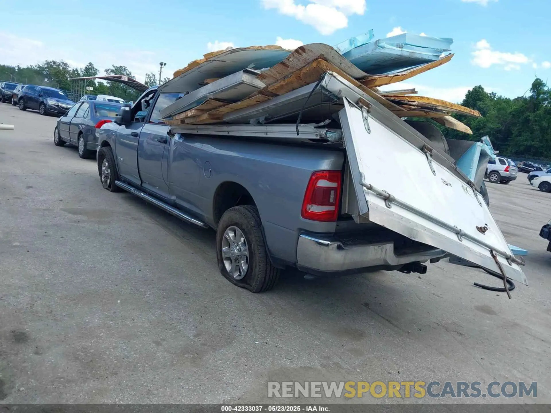 3 Photograph of a damaged car 3C63R3HL1RG198705 RAM 3500 2024