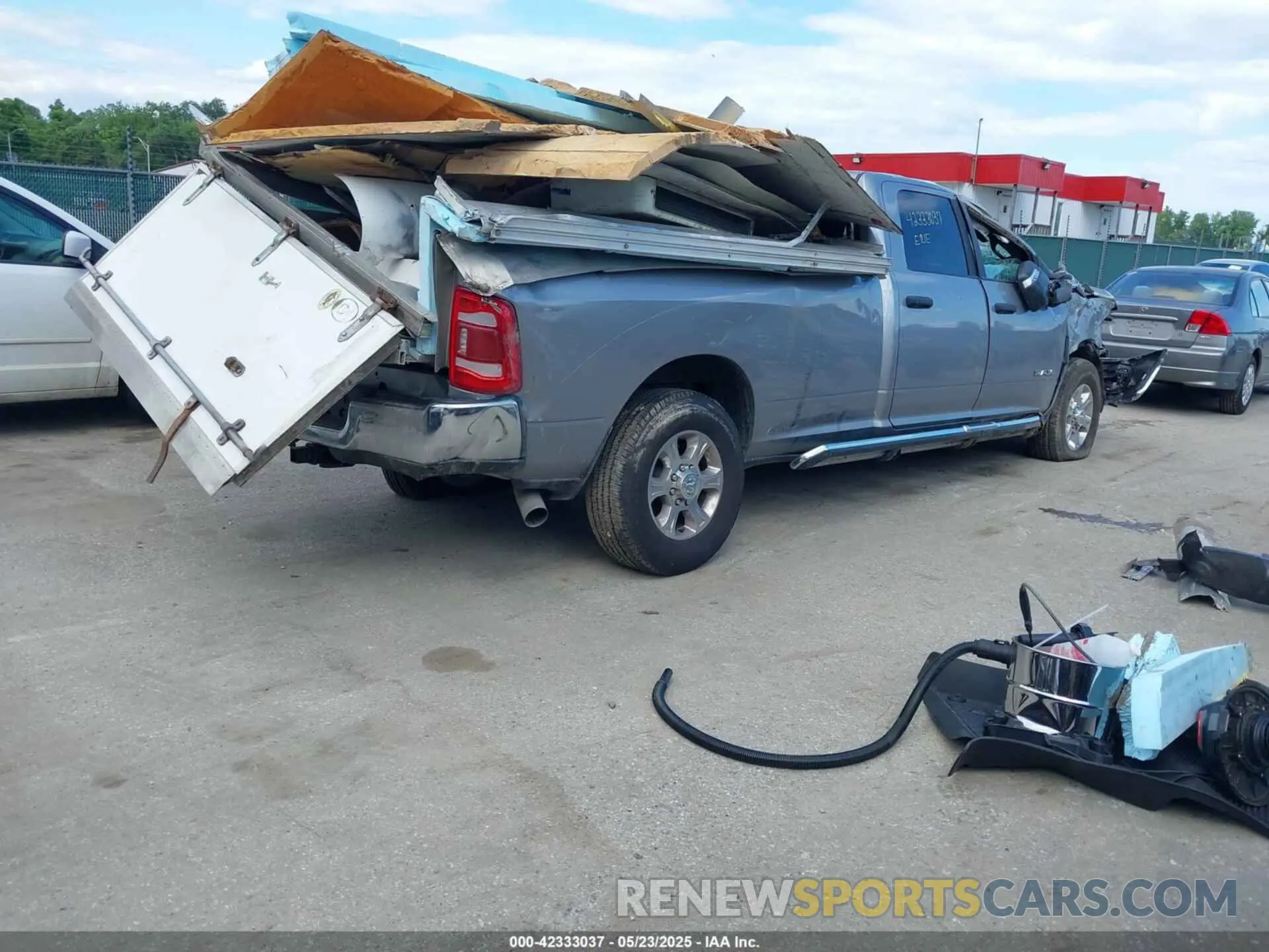4 Photograph of a damaged car 3C63R3HL1RG198705 RAM 3500 2024