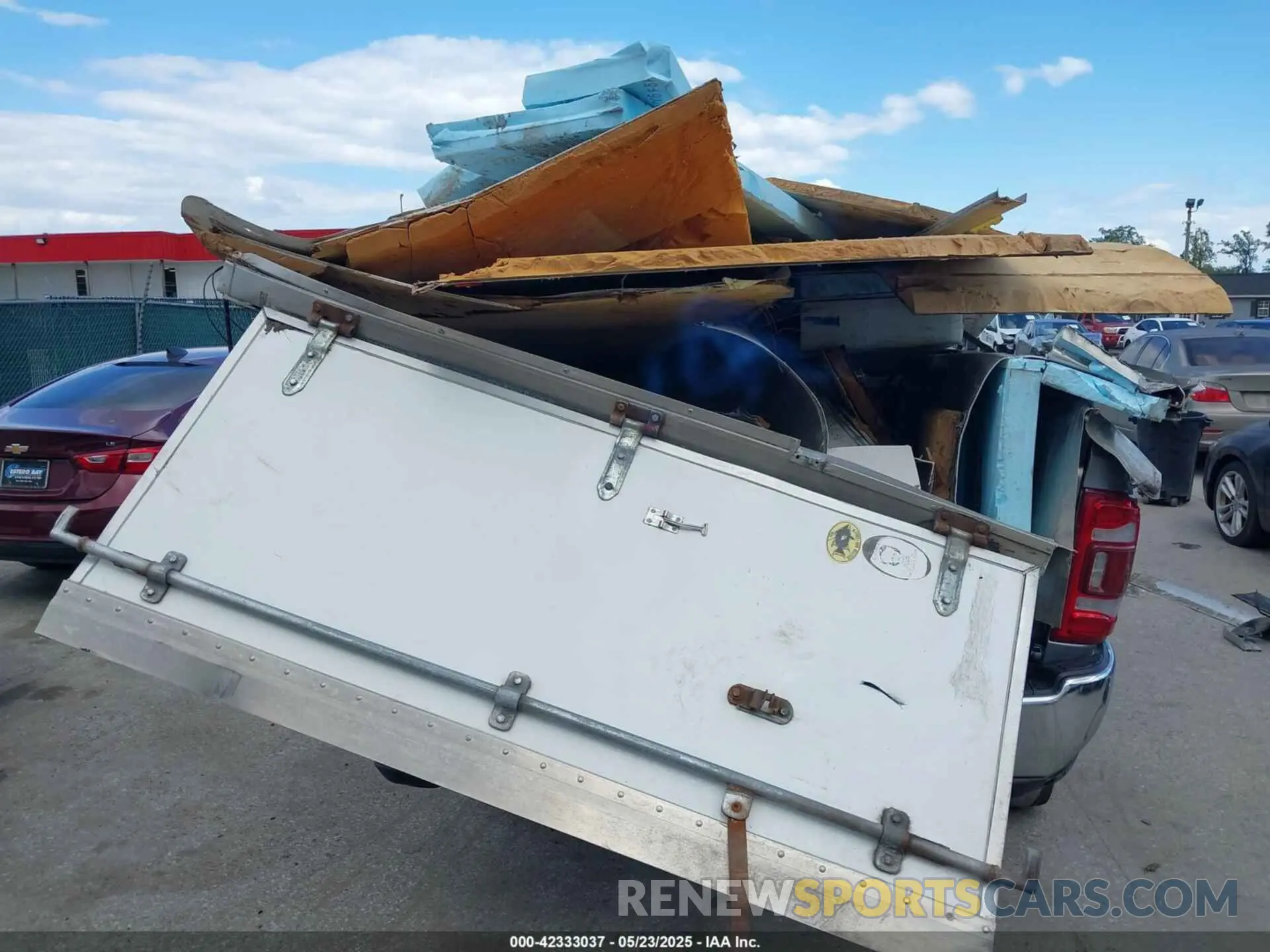 6 Photograph of a damaged car 3C63R3HL1RG198705 RAM 3500 2024