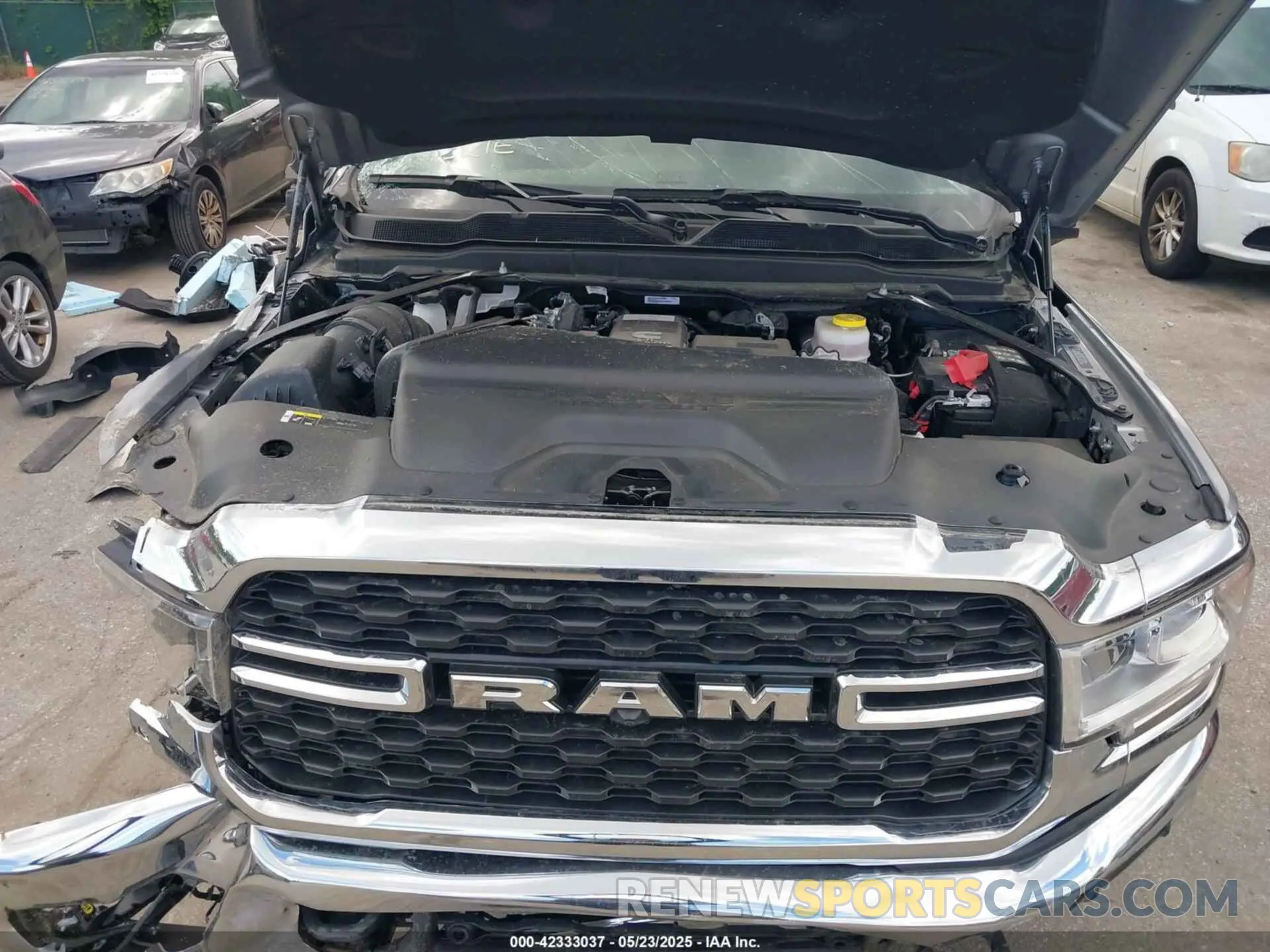 9 Photograph of a damaged car 3C63R3HL1RG198705 RAM 3500 2024