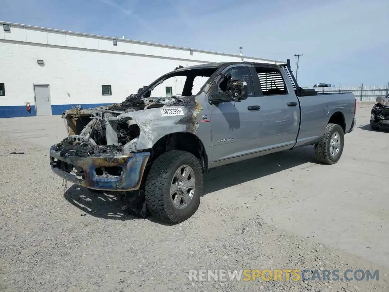 1 Photograph of a damaged car 3C63R3HL5RG149099 RAM 3500 2024