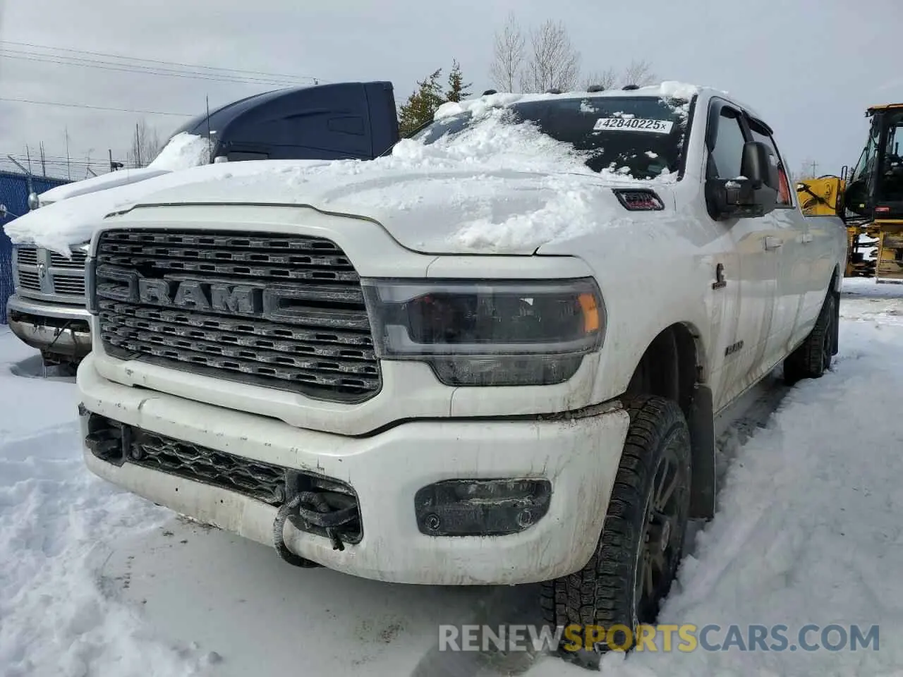1 Photograph of a damaged car 3C63R3HL7RG203065 RAM 3500 2024