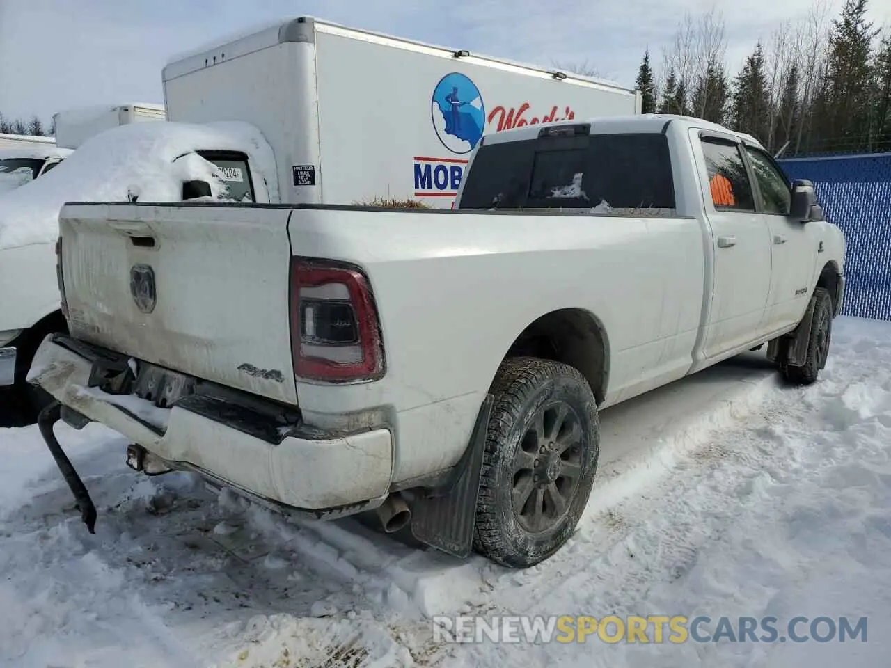 3 Photograph of a damaged car 3C63R3HL7RG203065 RAM 3500 2024