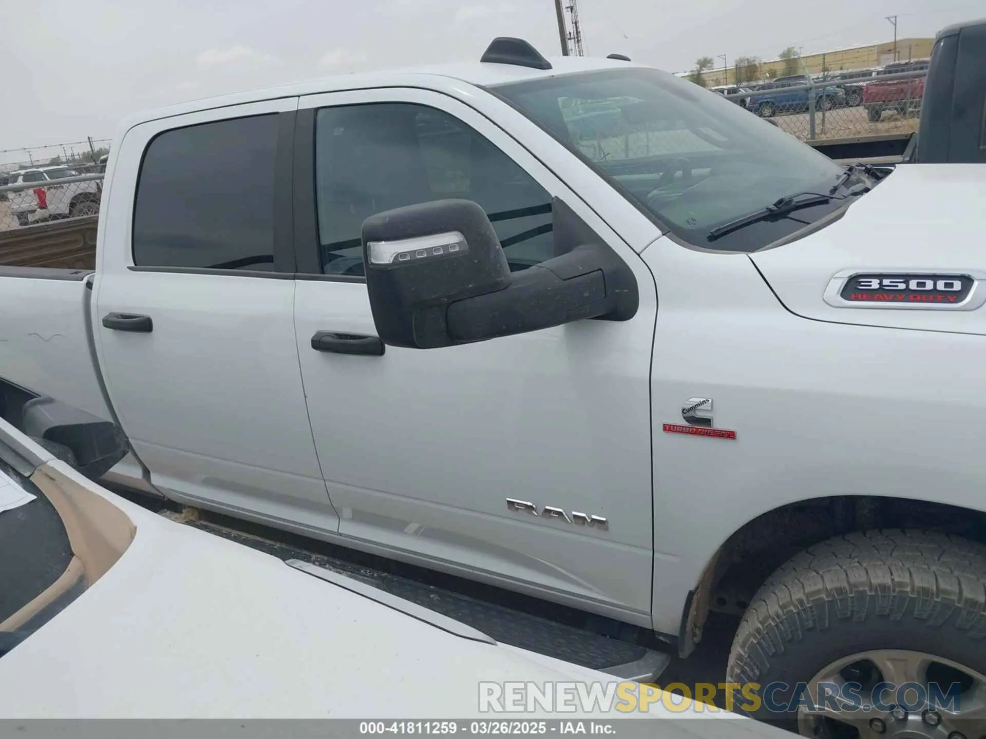 13 Photograph of a damaged car 3C63R3HL9RG165581 RAM 3500 2024